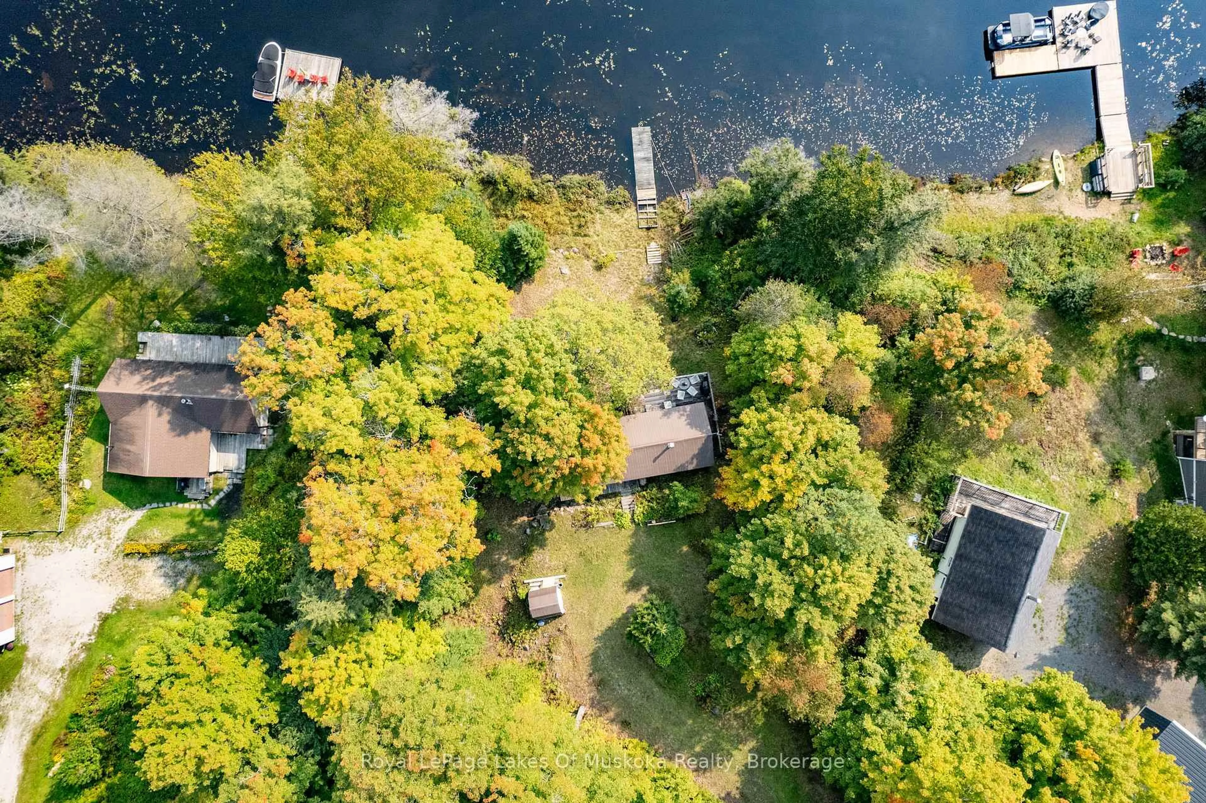 A pic from outside/outdoor area/front of a property/back of a property/a pic from drone, water/lake/river/ocean view for 1119 GRIST MILL Lane, Algonquin Highlands Ontario P0A 1E0