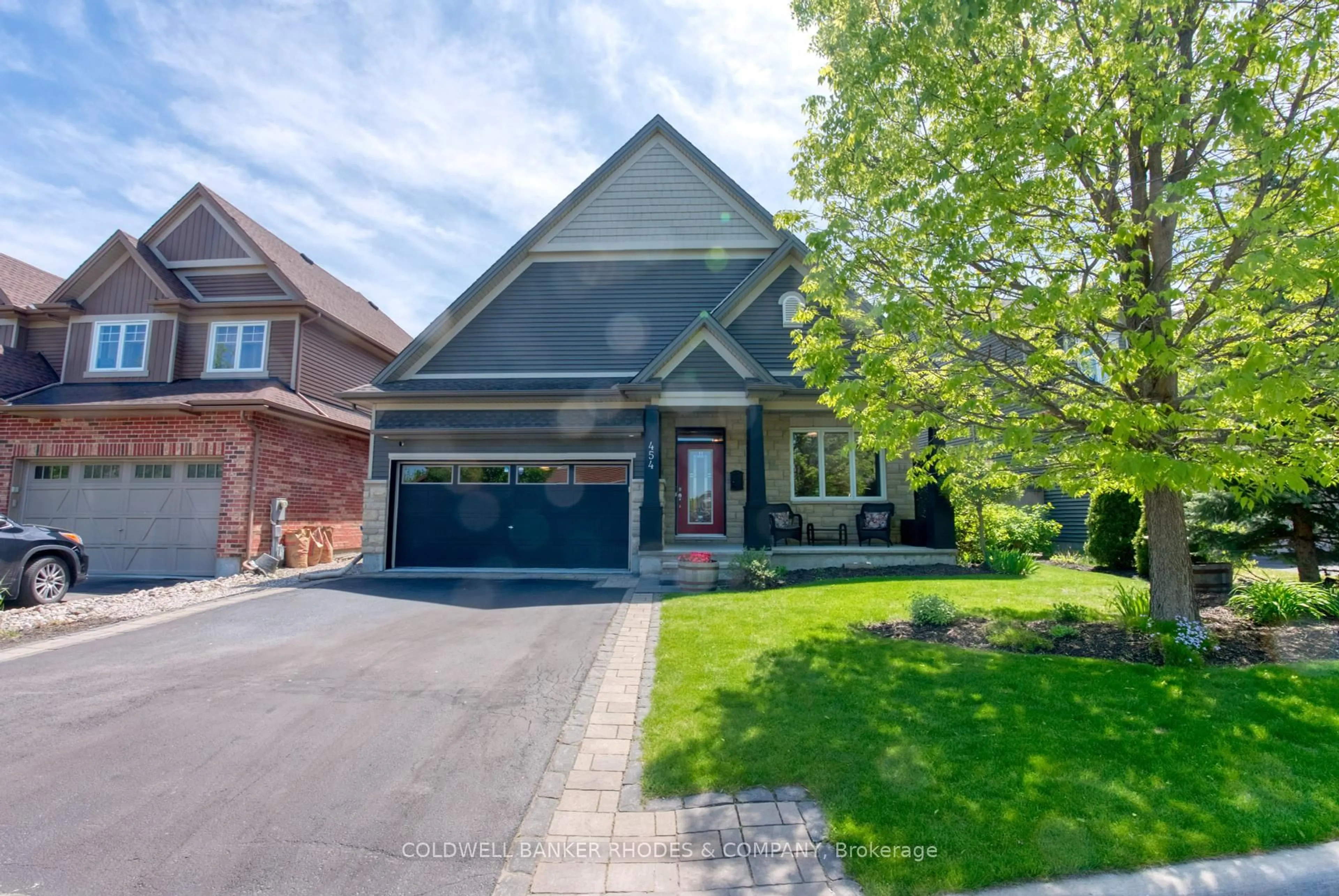 Home with brick exterior material, street for 454 Creekview Way, Ottawa Ontario K1T 0J5