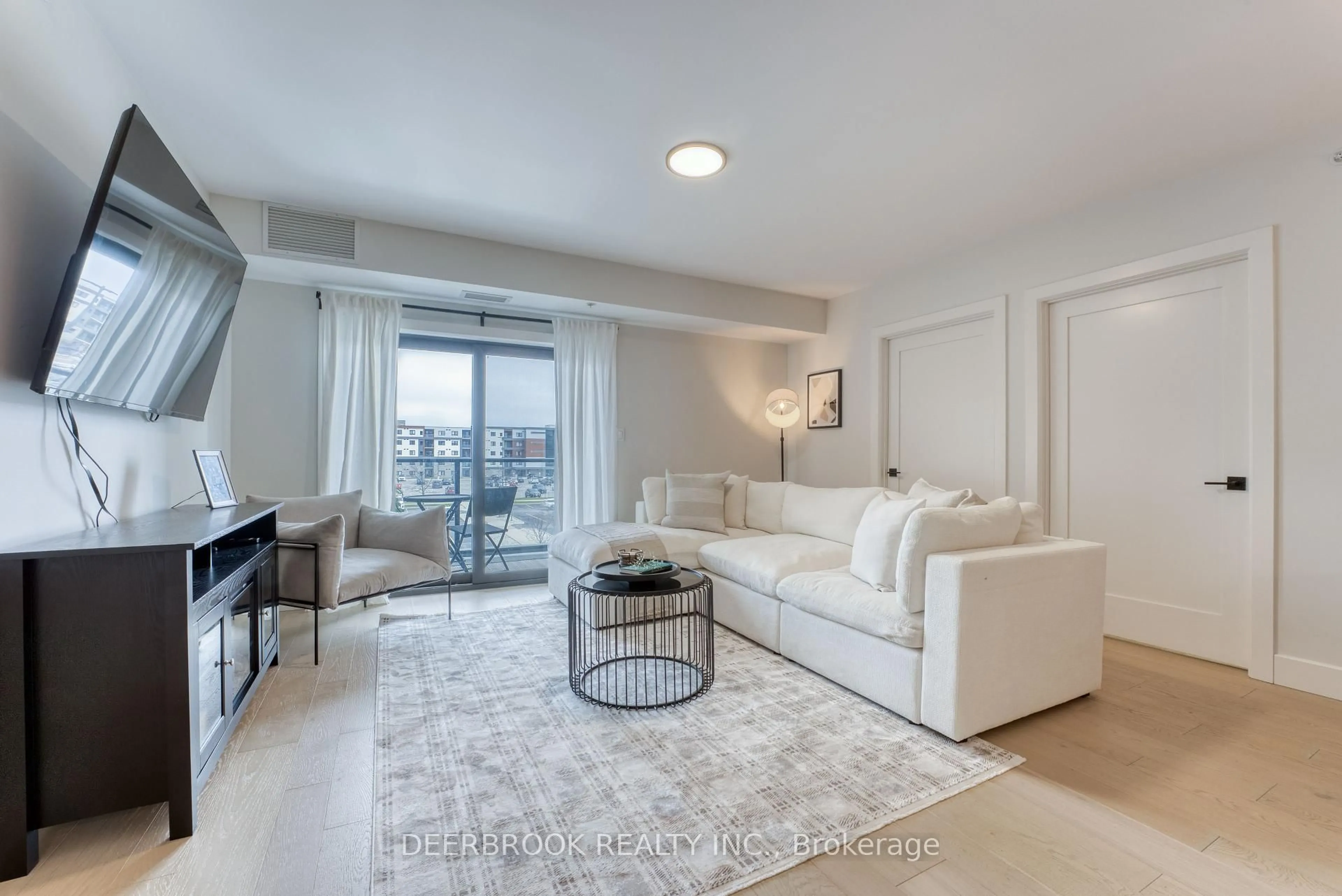 Living room with furniture, unknown for 4578 Huron Church Line Rd #313, LaSalle Ontario N9H 0M2