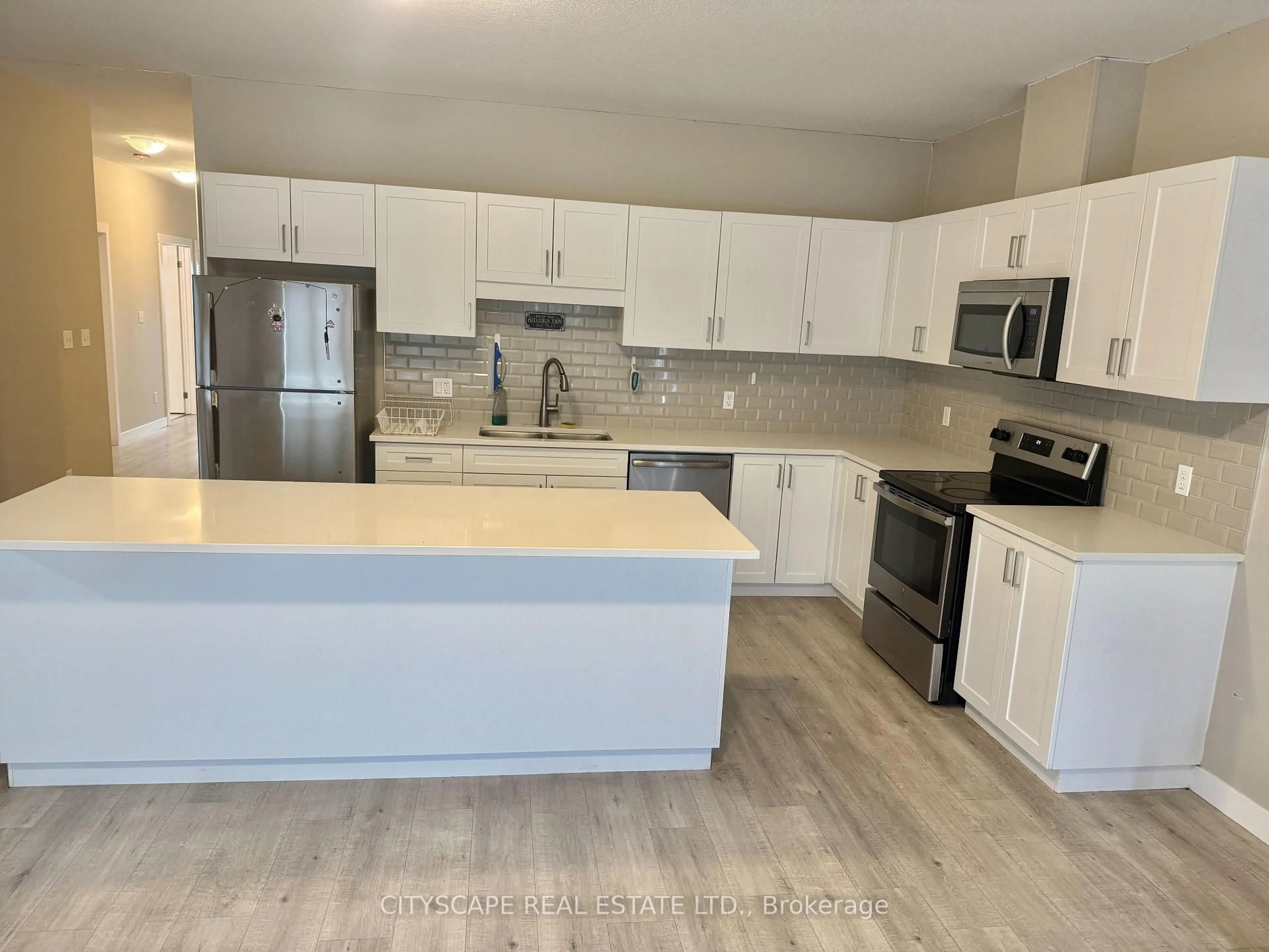 Open concept kitchen, unknown for 51 Waterthrush Lane, Norfolk Ontario N3Y 0E9