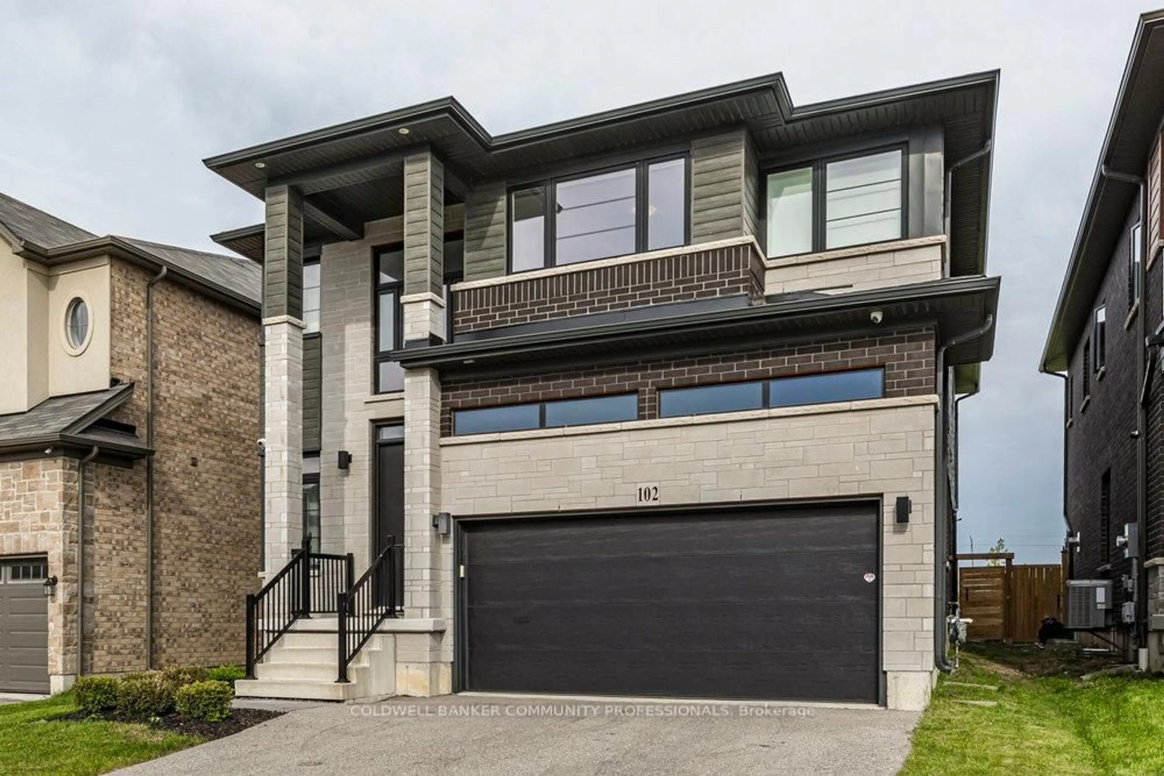 Home with brick exterior material, street for 102 Greenwich Ave, Hamilton Ontario L8J 0L6