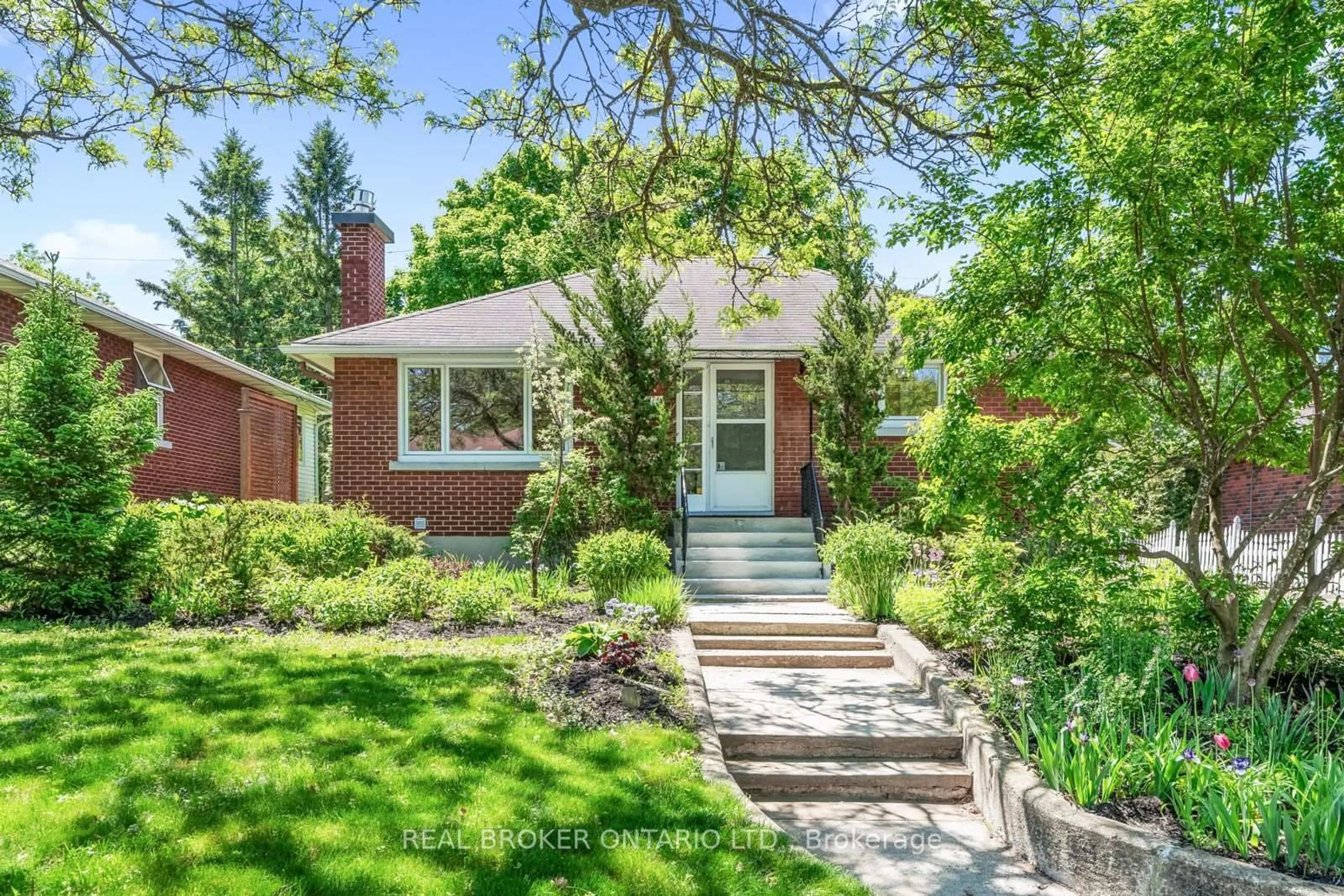Home with brick exterior material, street for 174 Dahlia Ave, Ottawa Ontario K1H 6G2