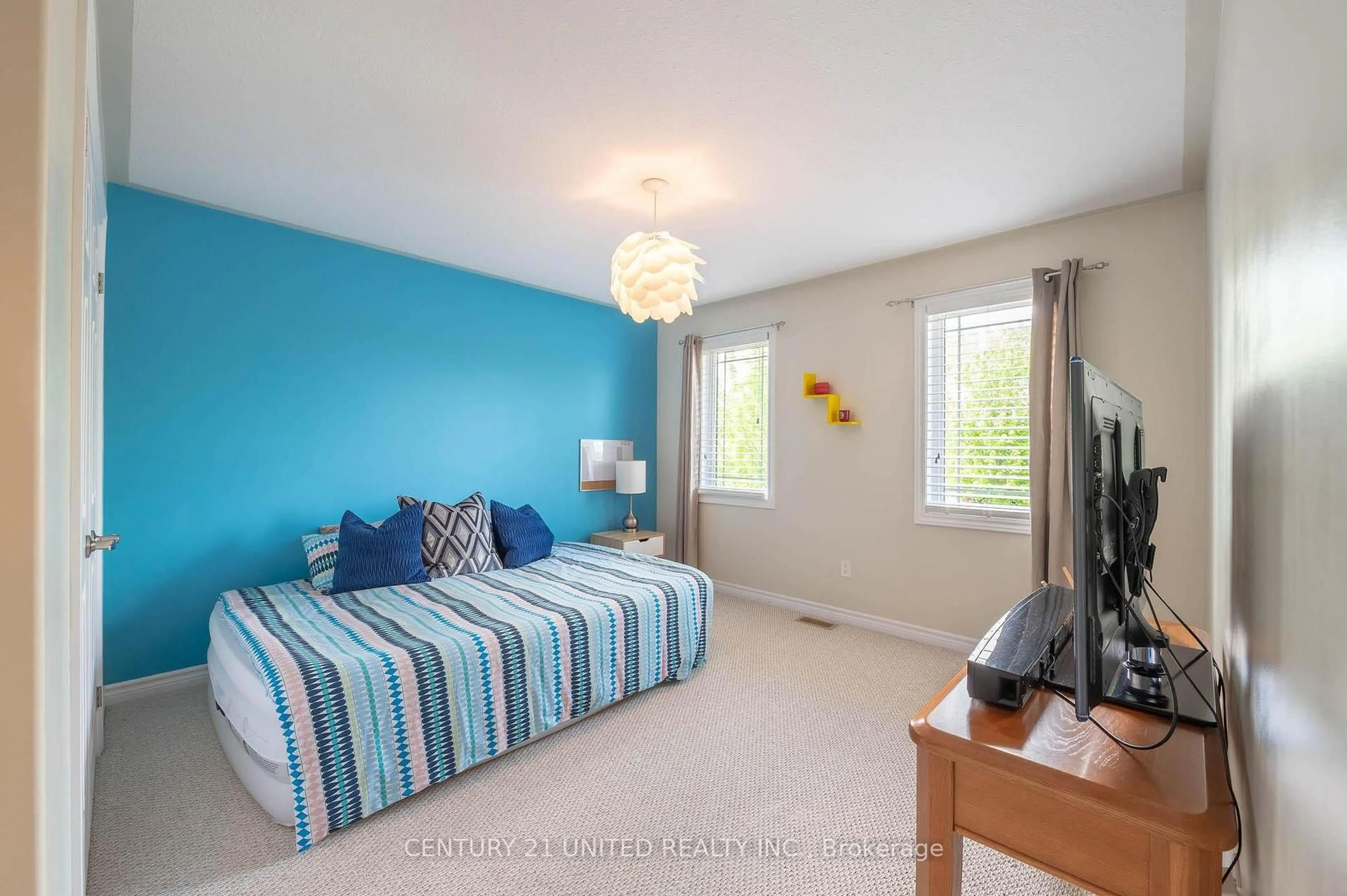 Bedroom with bed, wood/laminate floor for 451 Raymond St, Peterborough North Ontario K9H 7P3