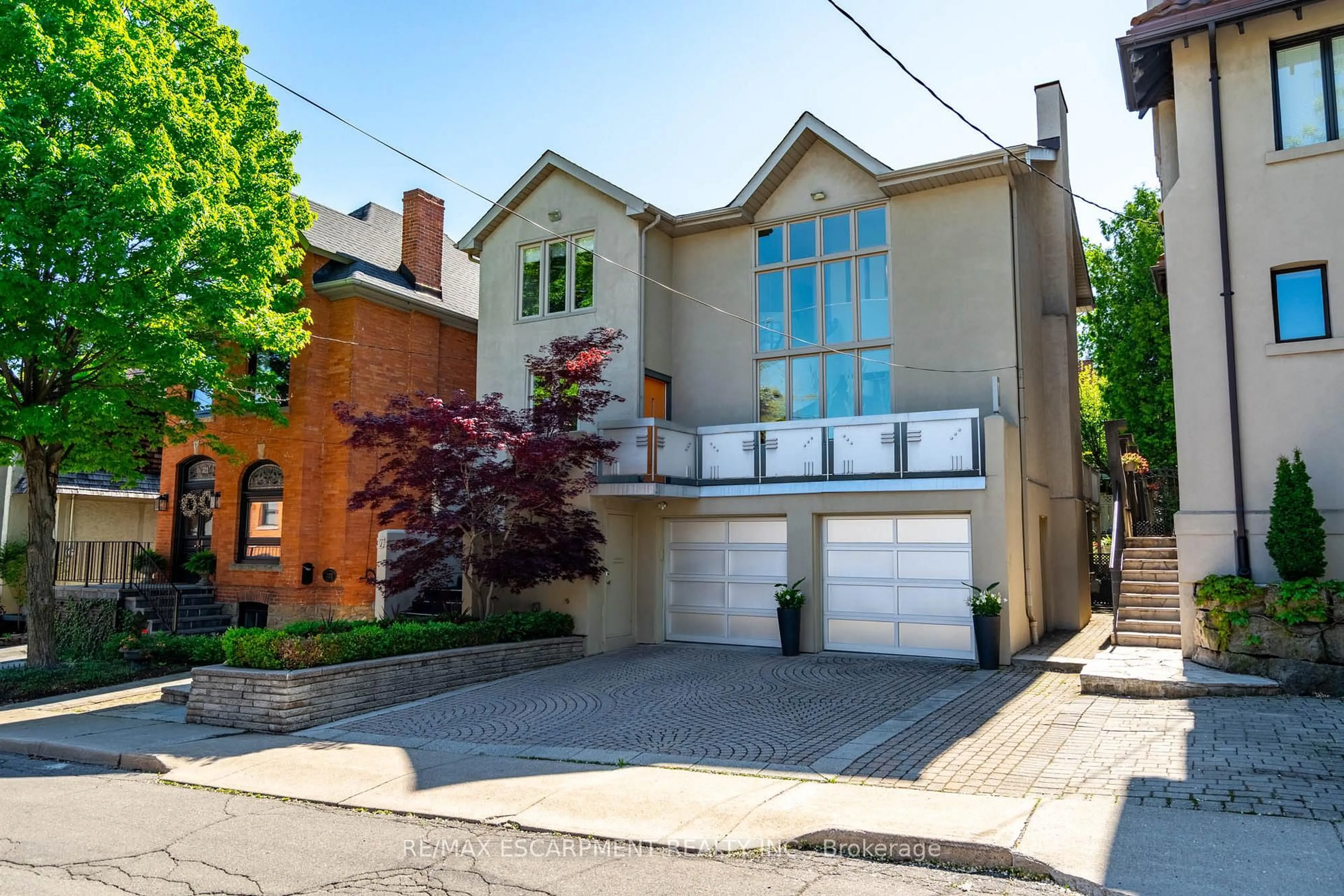Home with brick exterior material, street for 327 Caroline St, Hamilton Ontario L8P 3M2