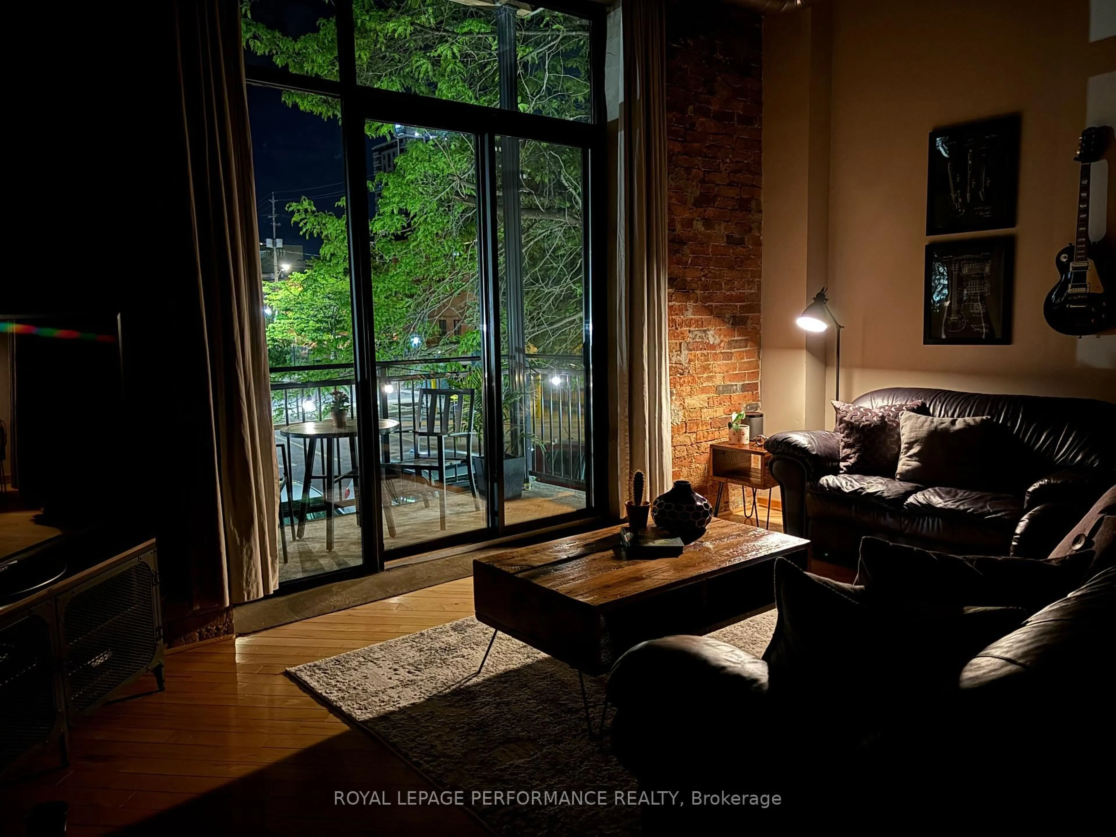Living room with furniture, wood/laminate floor for 95 Beech St #108, Ottawa Ontario K1S 3J7