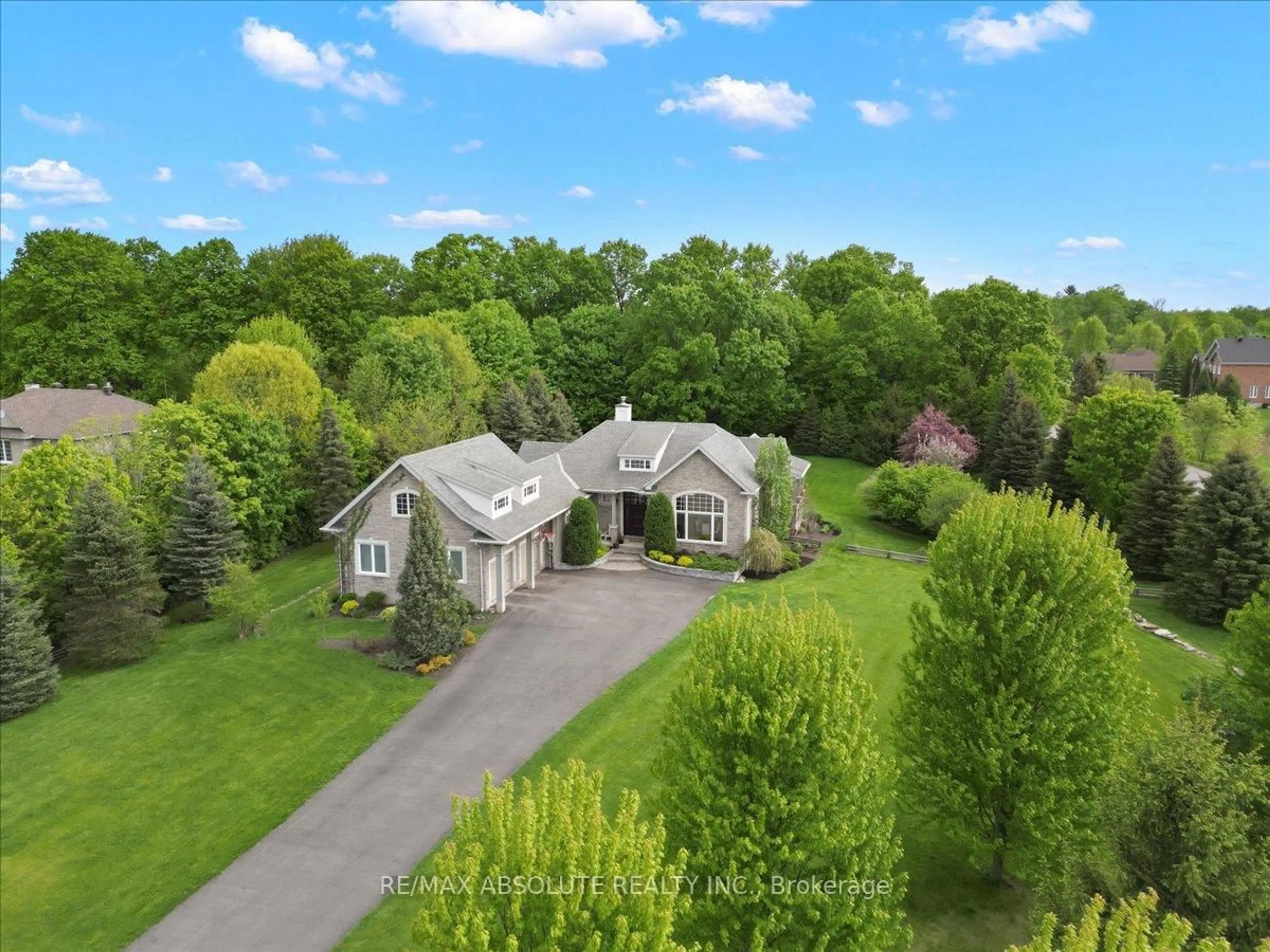 A pic from outside/outdoor area/front of a property/back of a property/a pic from drone, unknown for 1832 Rocklane Dr, Kanata Ontario K2W 1B5