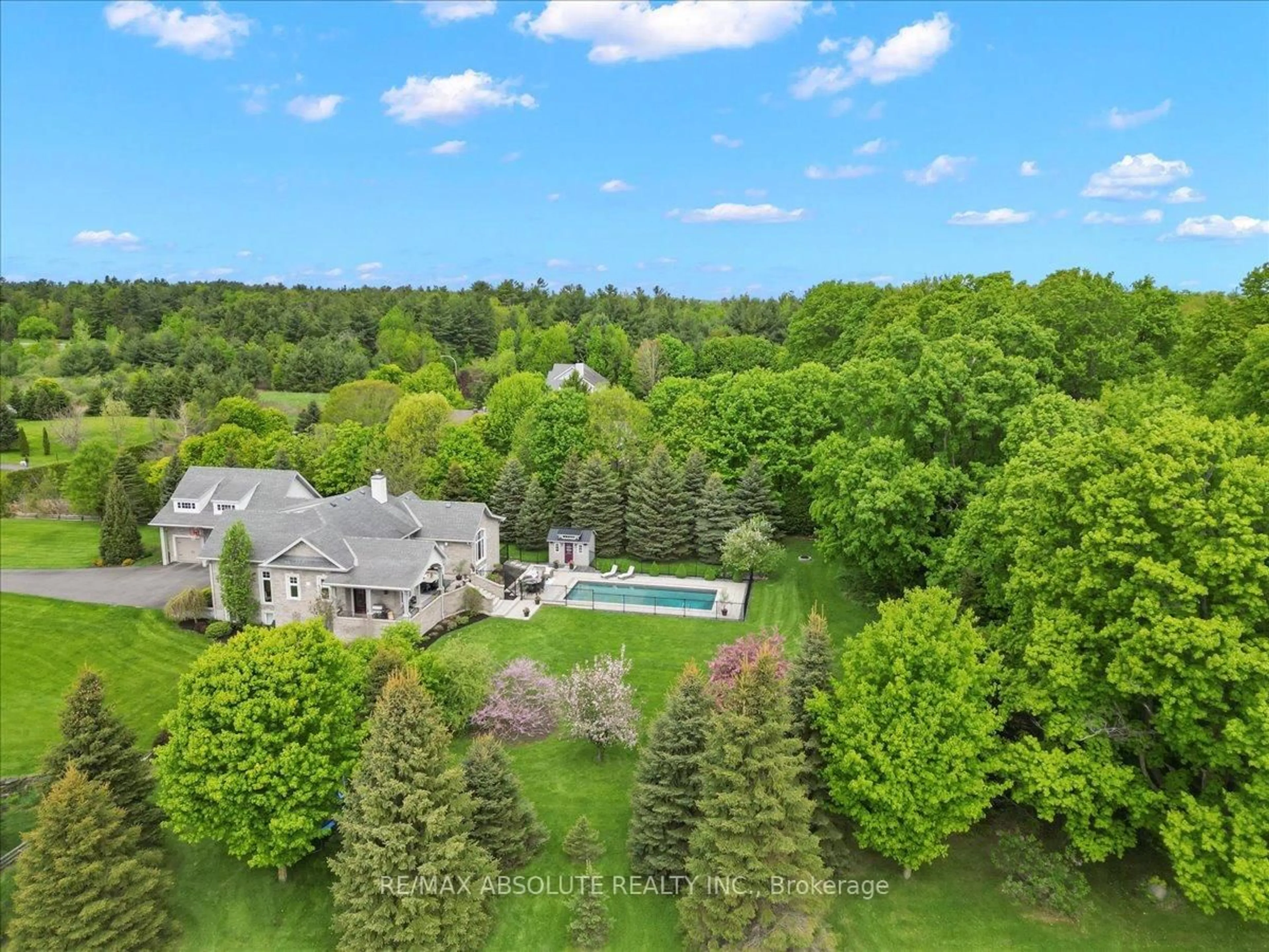 A pic from outside/outdoor area/front of a property/back of a property/a pic from drone, water/lake/river/ocean view for 1832 Rocklane Dr, Kanata Ontario K2W 1B5