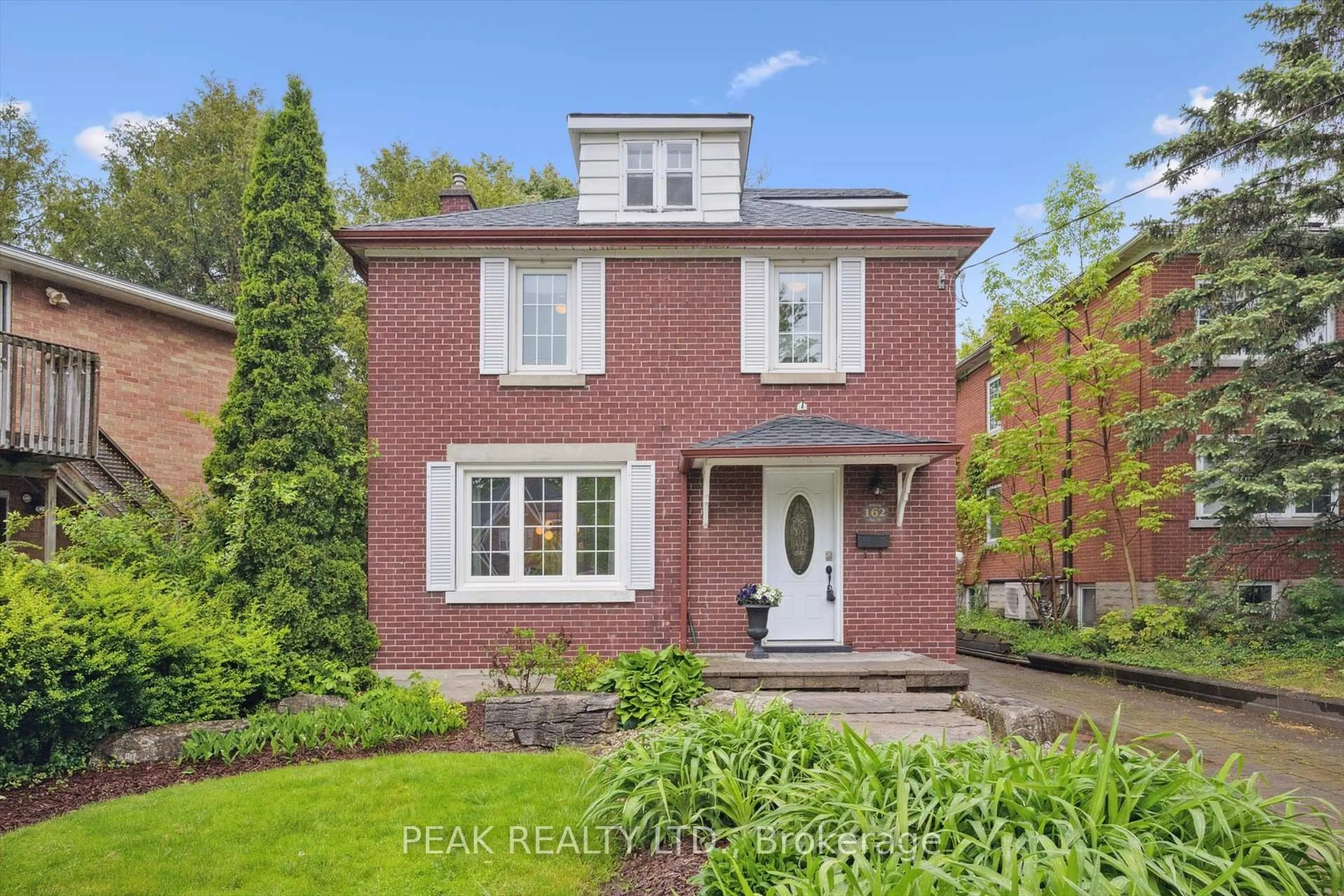 Home with brick exterior material, street for 162 Moore St, Waterloo Ontario N2J 1X6