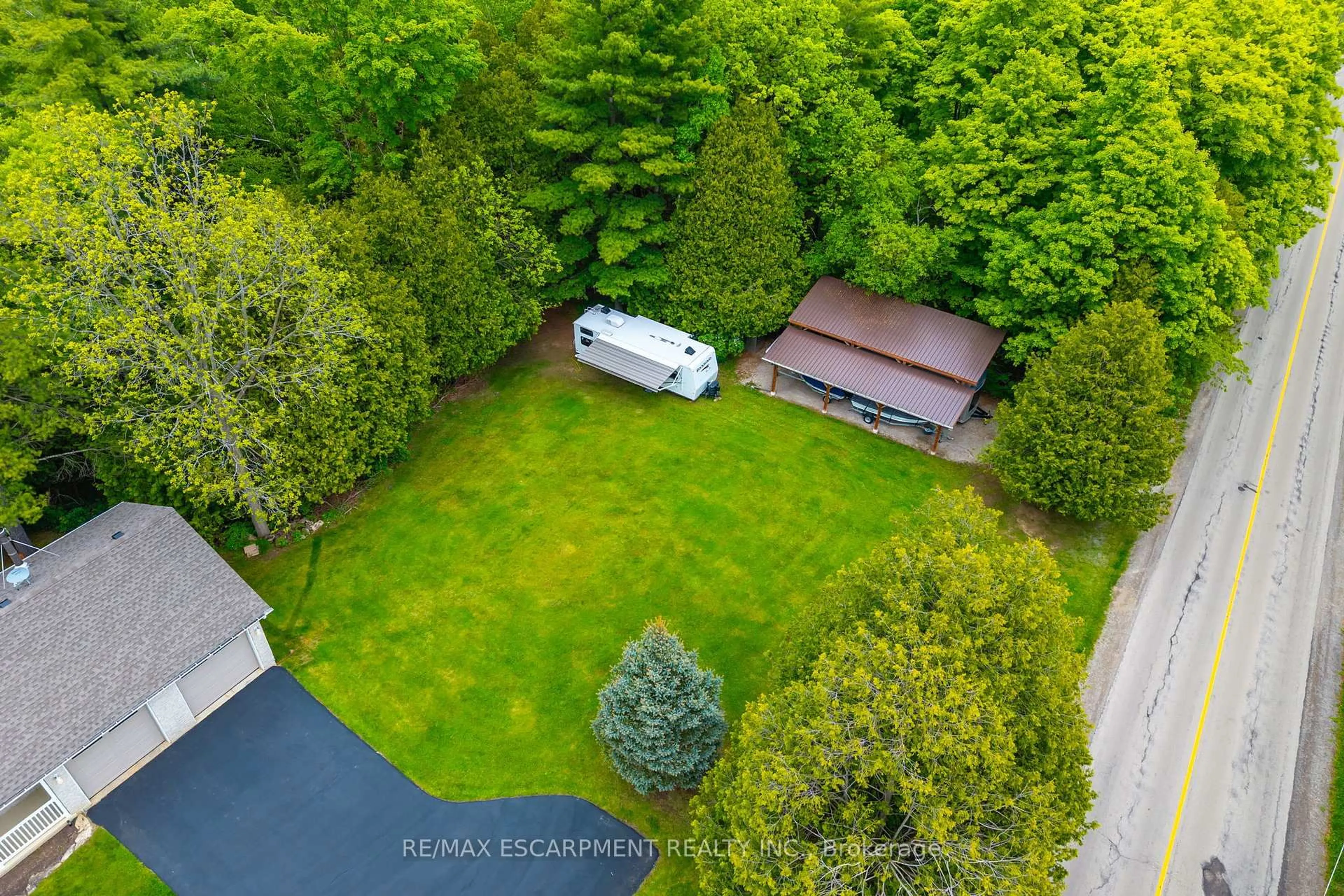 A pic from outside/outdoor area/front of a property/back of a property/a pic from drone, forest/trees view for 1323 8TH Concession Rd, Hamilton Ontario N0B 2J0