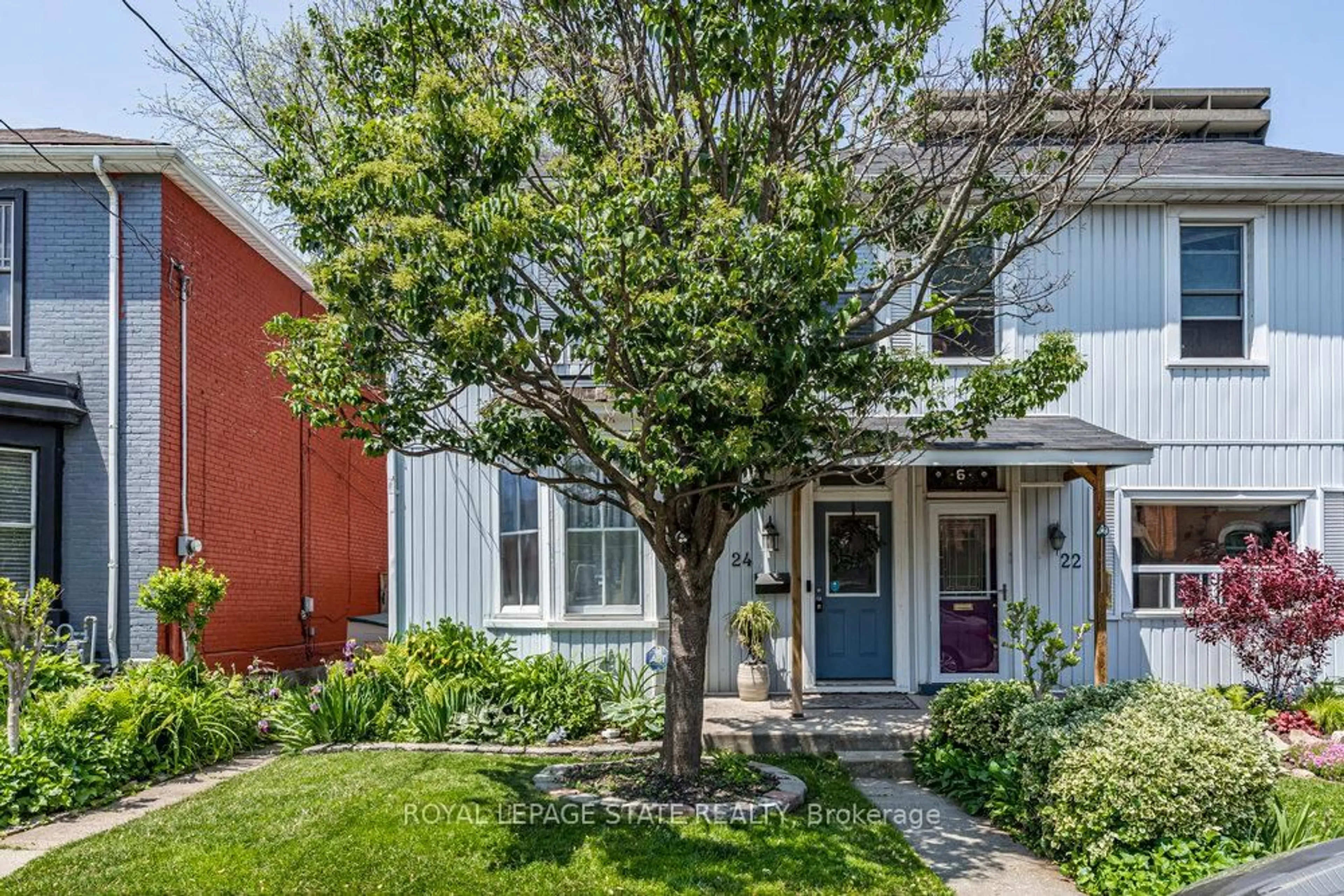 Home with brick exterior material, street for 24 Liberty St, Hamilton Ontario L8N 2N6