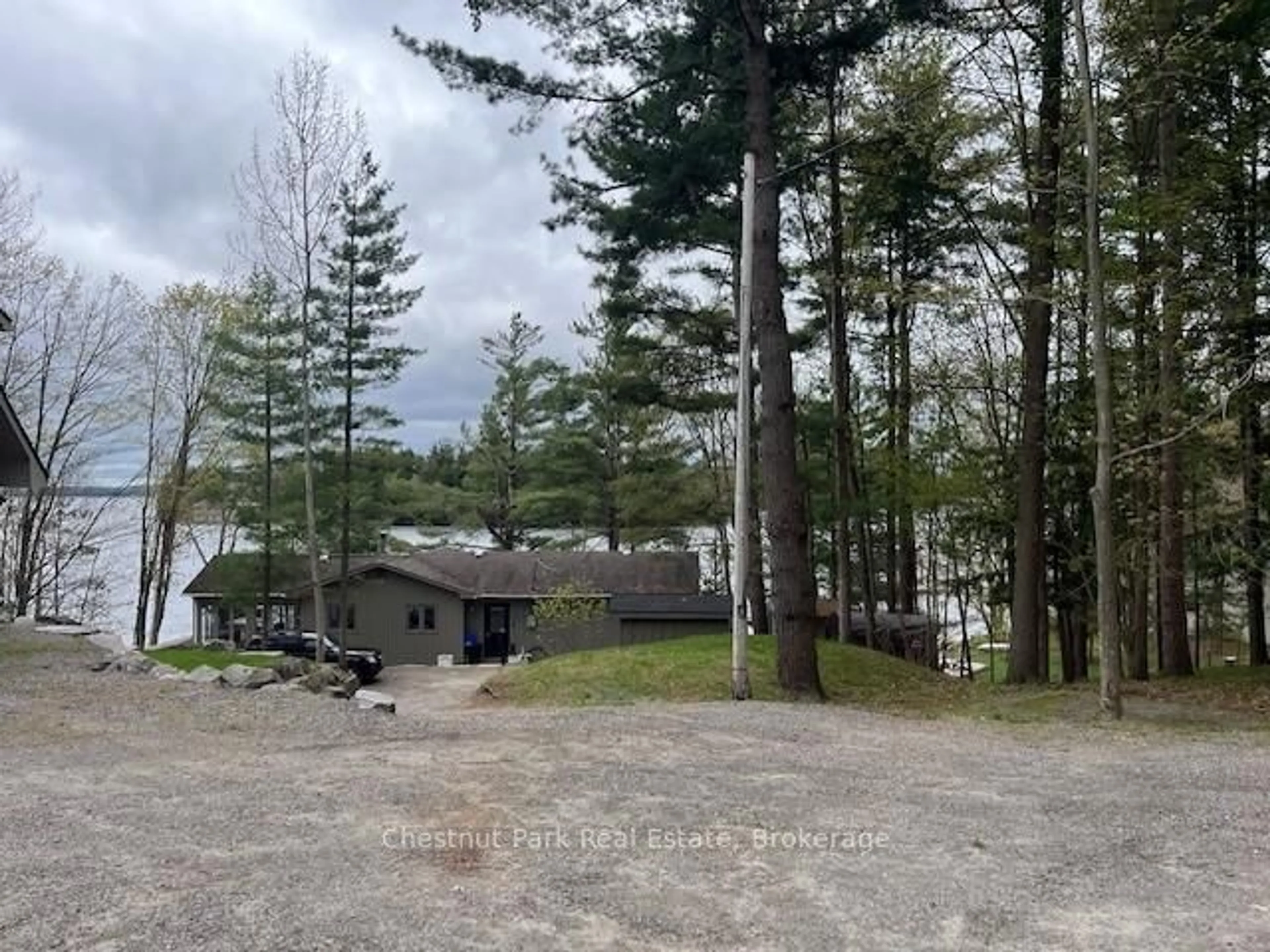 A pic from outside/outdoor area/front of a property/back of a property/a pic from drone, water/lake/river/ocean view for 1011 Beaumaris Rd ##4, Muskoka Lakes Ontario P1L 1W8