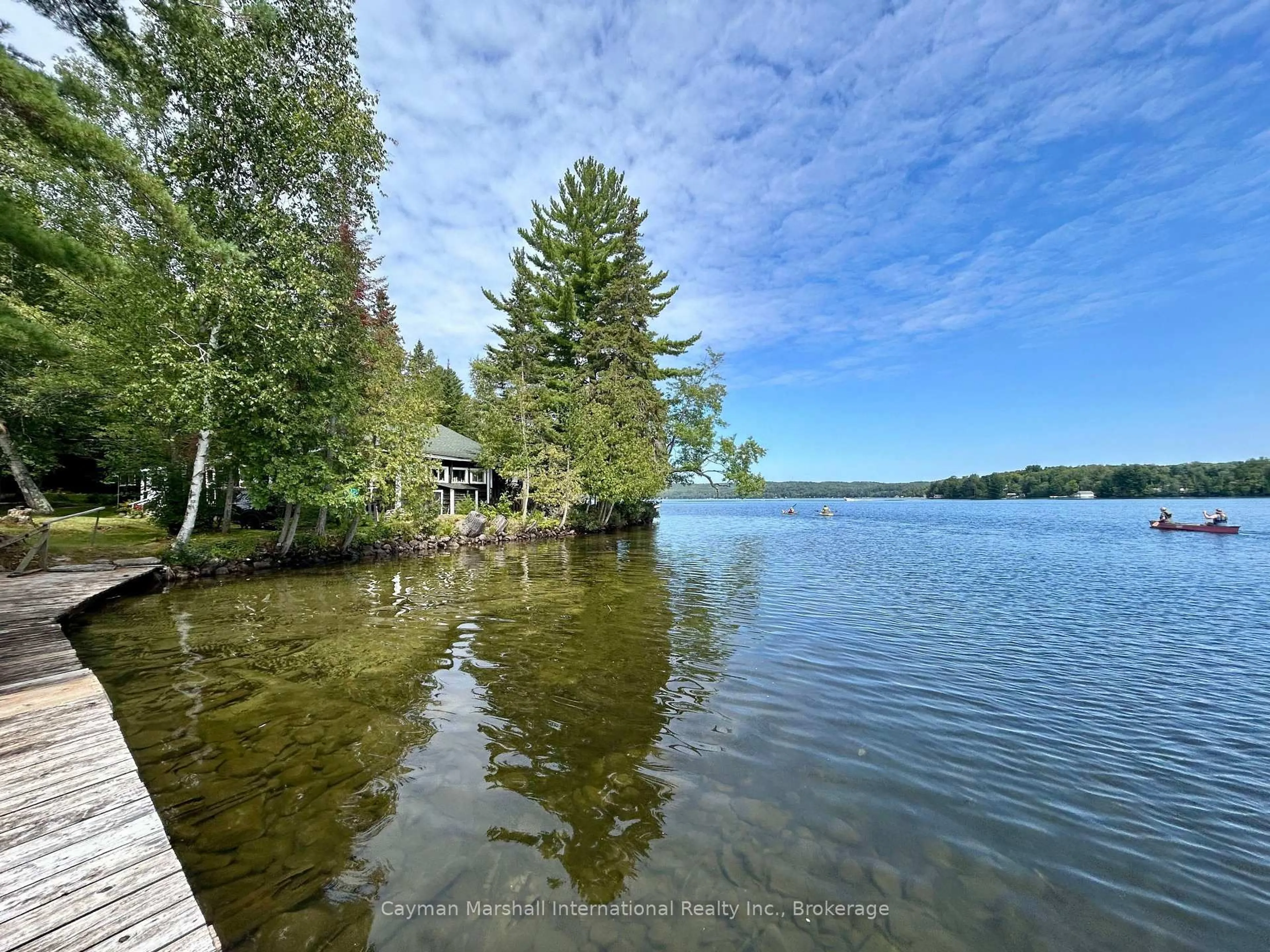 A pic from outside/outdoor area/front of a property/back of a property/a pic from drone, water/lake/river/ocean view for 1053 PUT IN BAY Lane #2, Lake of Bays Ontario P1H 2J6