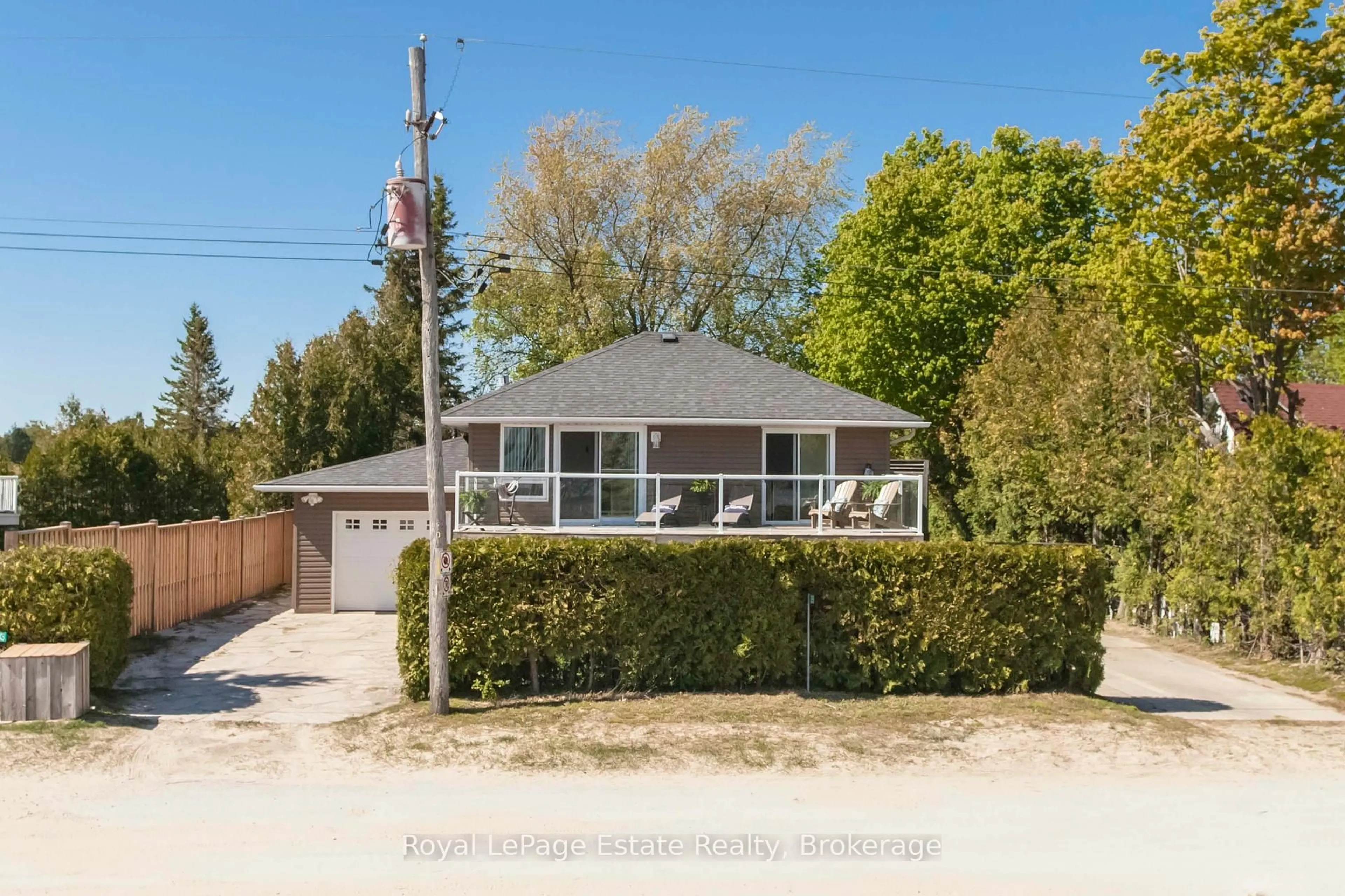 A pic from outside/outdoor area/front of a property/back of a property/a pic from drone, street for 35 Sauble Falls Rd, South Bruce Peninsula Ontario N0H 2G0