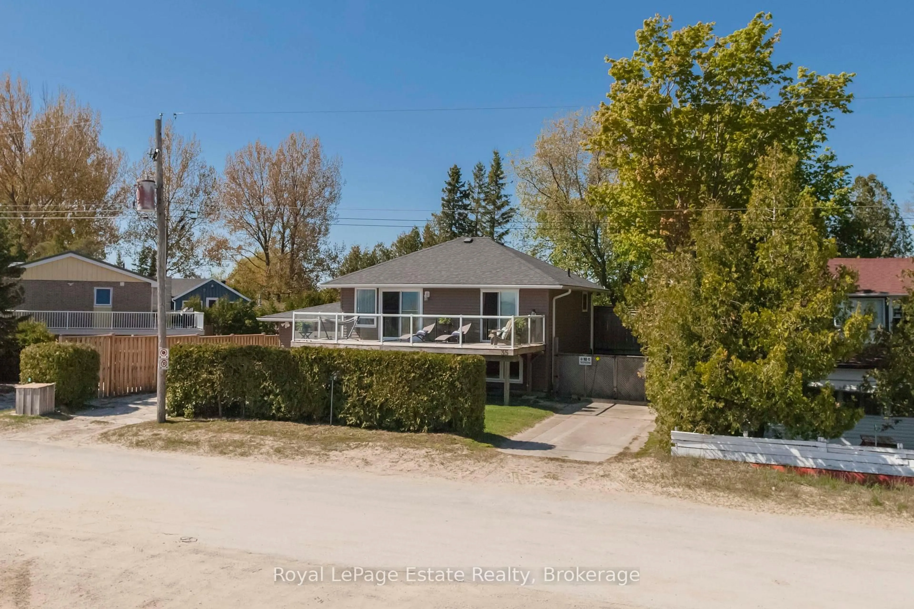 A pic from outside/outdoor area/front of a property/back of a property/a pic from drone, street for 35 Sauble Falls Rd, South Bruce Peninsula Ontario N0H 2G0