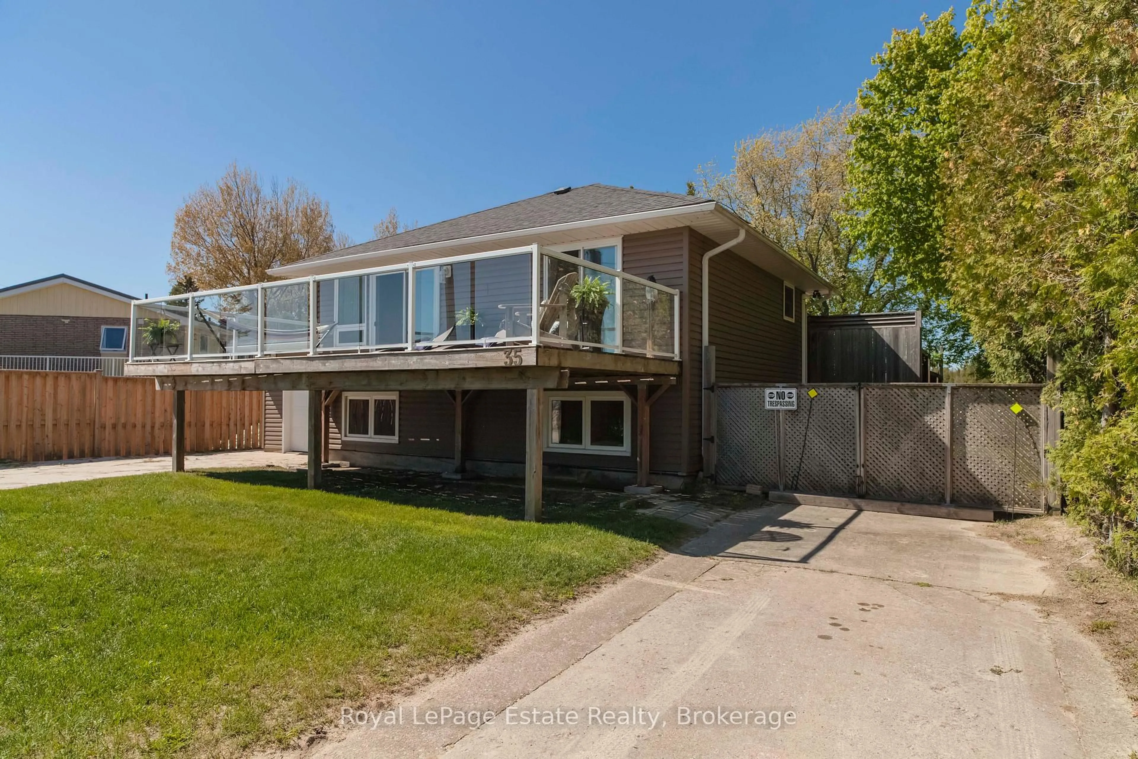 A pic from outside/outdoor area/front of a property/back of a property/a pic from drone, water/lake/river/ocean view for 35 Sauble Falls Rd, South Bruce Peninsula Ontario N0H 2G0