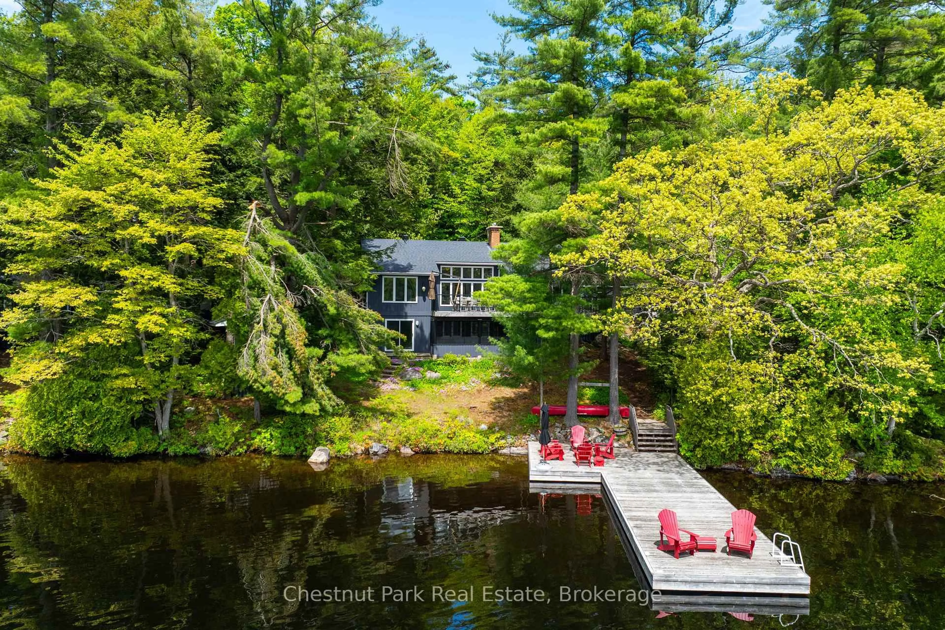 A pic from outside/outdoor area/front of a property/back of a property/a pic from drone, water/lake/river/ocean view for 1103 Hallett Rd 4 Rd, Muskoka Lakes Ontario P0C 1H0