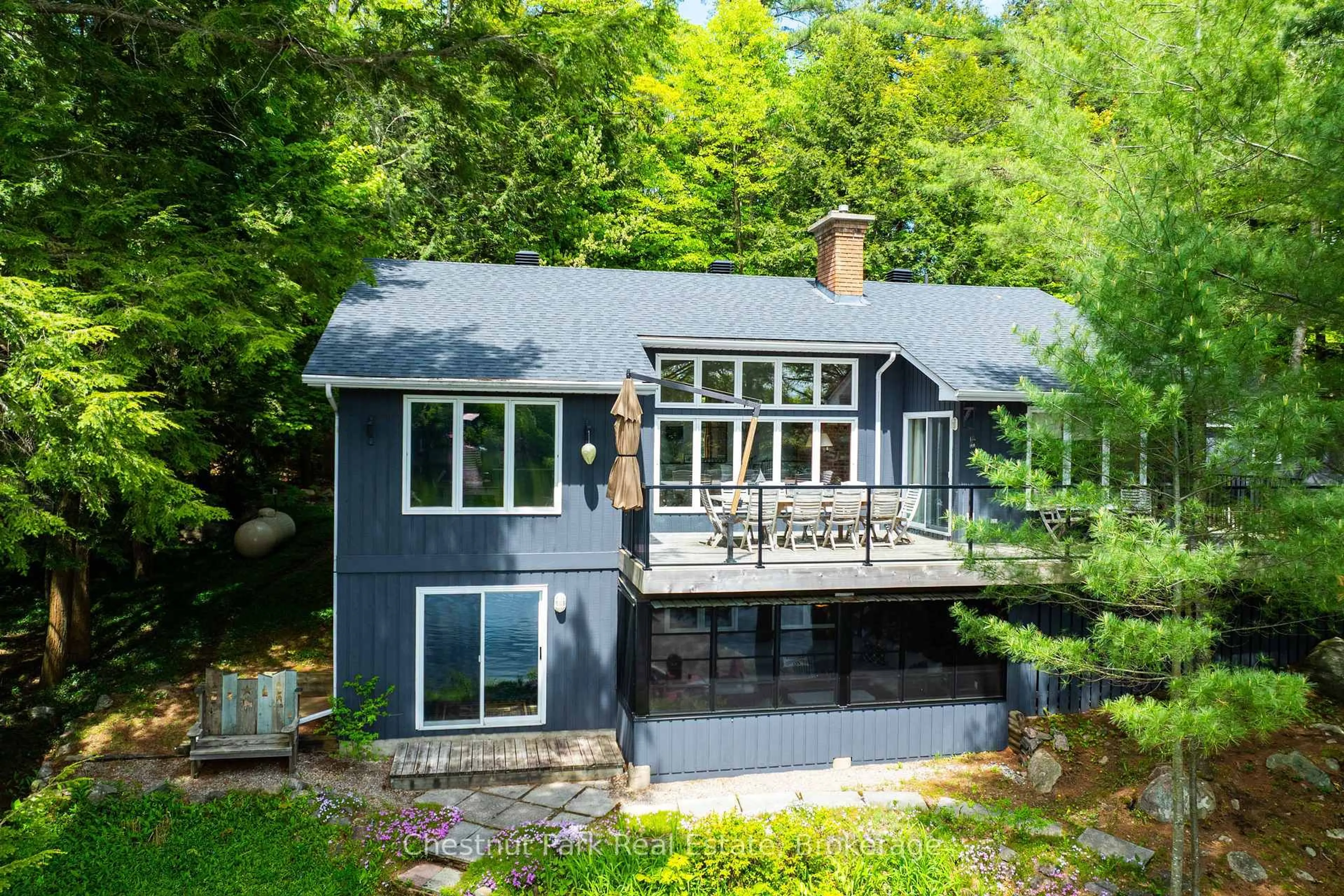 A pic from outside/outdoor area/front of a property/back of a property/a pic from drone, water/lake/river/ocean view for 1103 Hallett Rd 4 Rd, Muskoka Lakes Ontario P0C 1H0