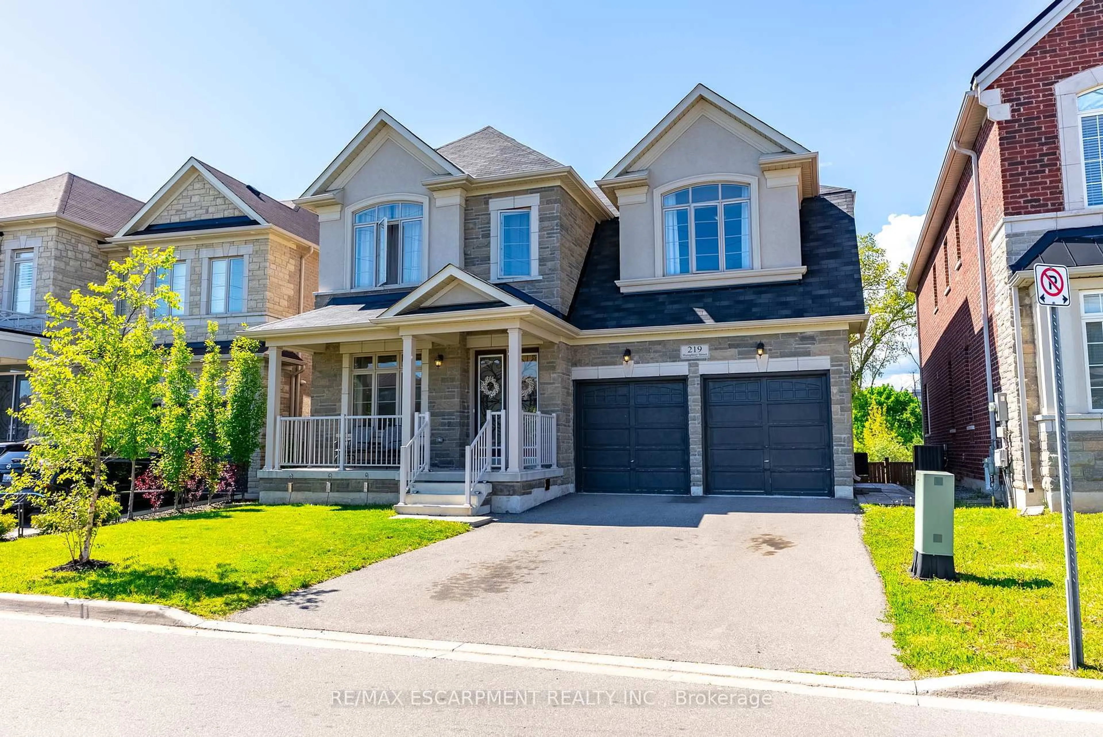 Home with brick exterior material, street for 219 Humphrey St, Hamilton Ontario L8B 1X4