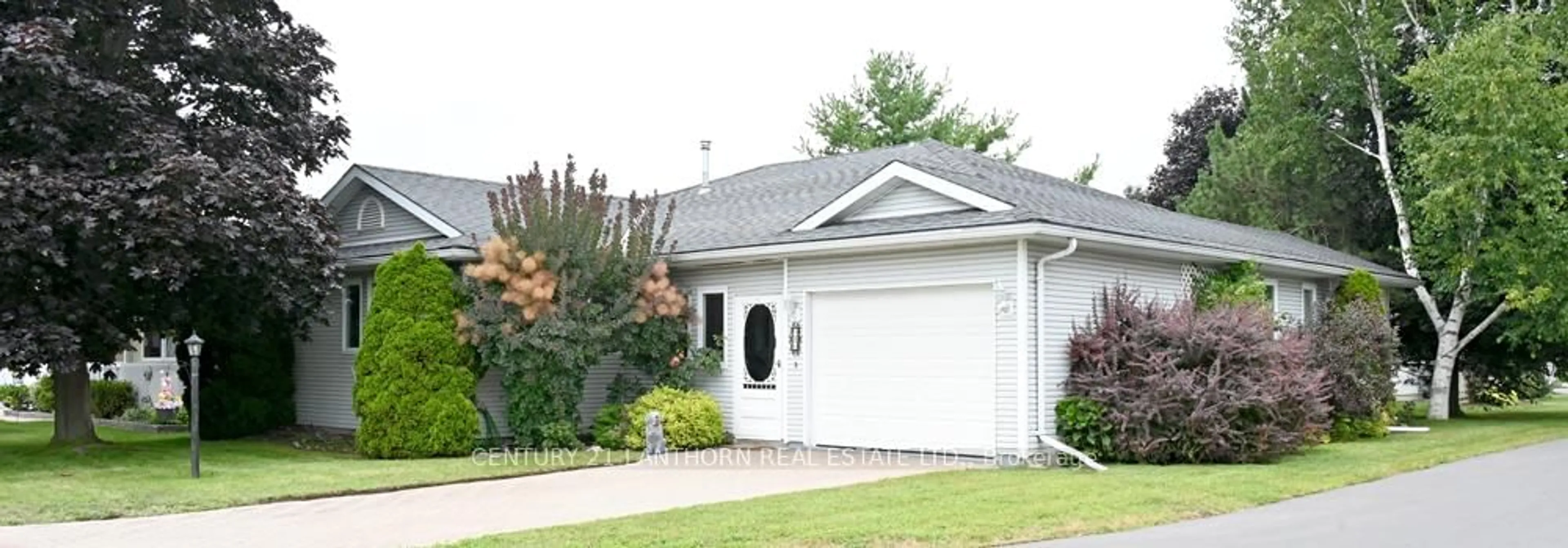 Home with vinyl exterior material, street for 1 Reynolds Pl, Prince Edward County Ontario K0K 3L0