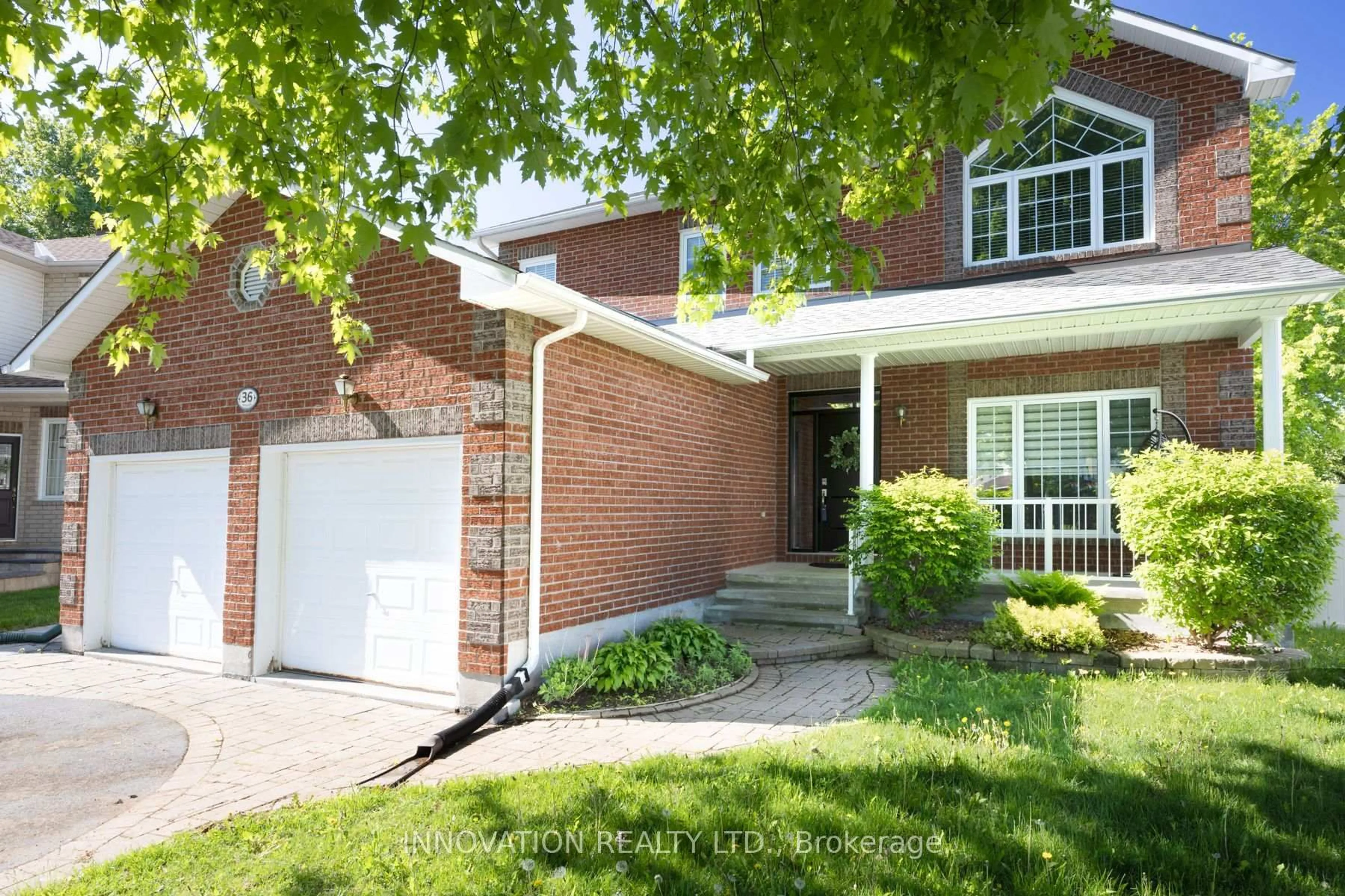 Home with brick exterior material, street for 36 La Prairie St, Russell Ontario K0A 1W0