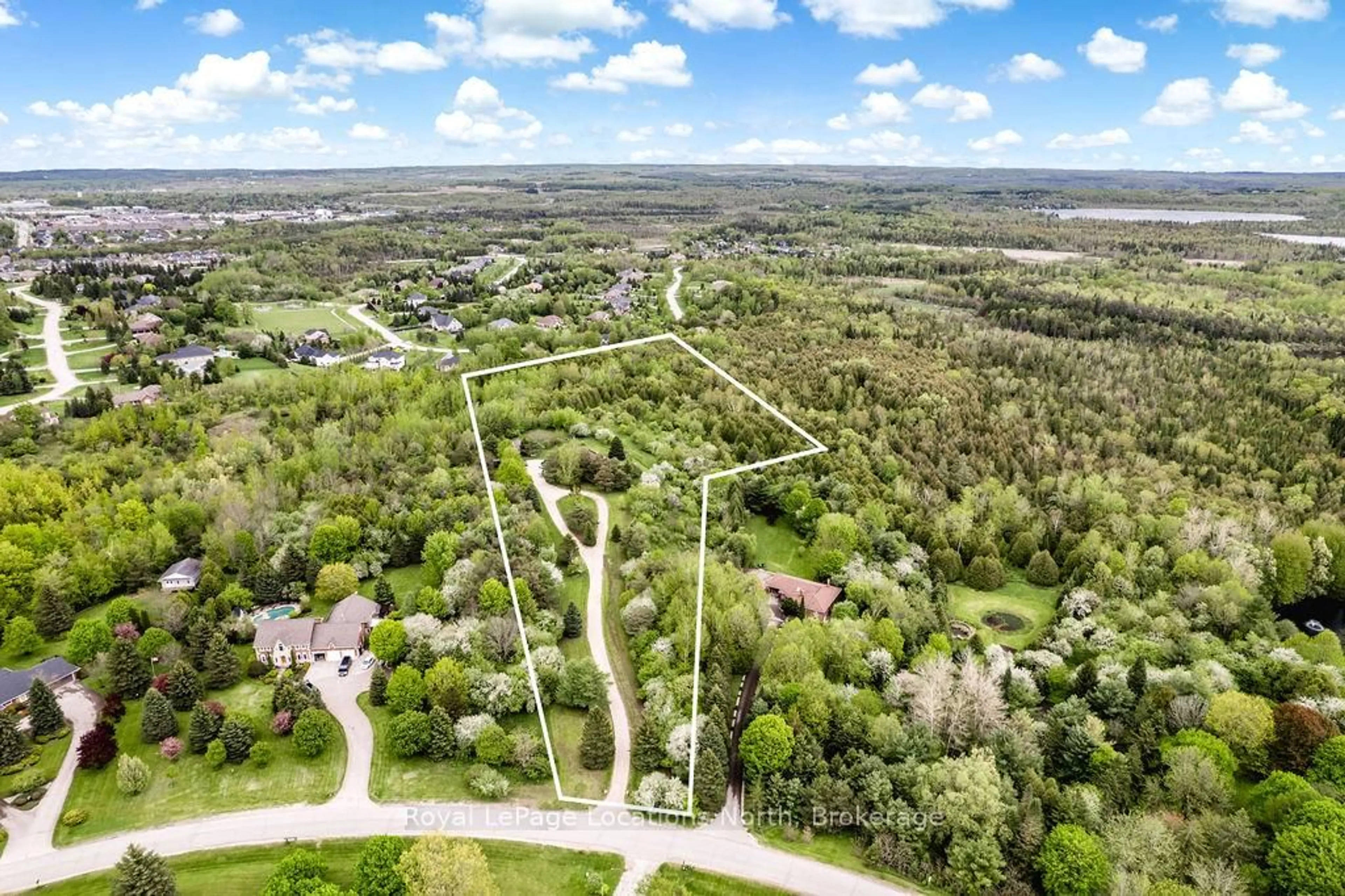 A pic from outside/outdoor area/front of a property/back of a property/a pic from drone, forest/trees view for 38 Old Carriage Rd, East Garafraxa Ontario L9W 6B2