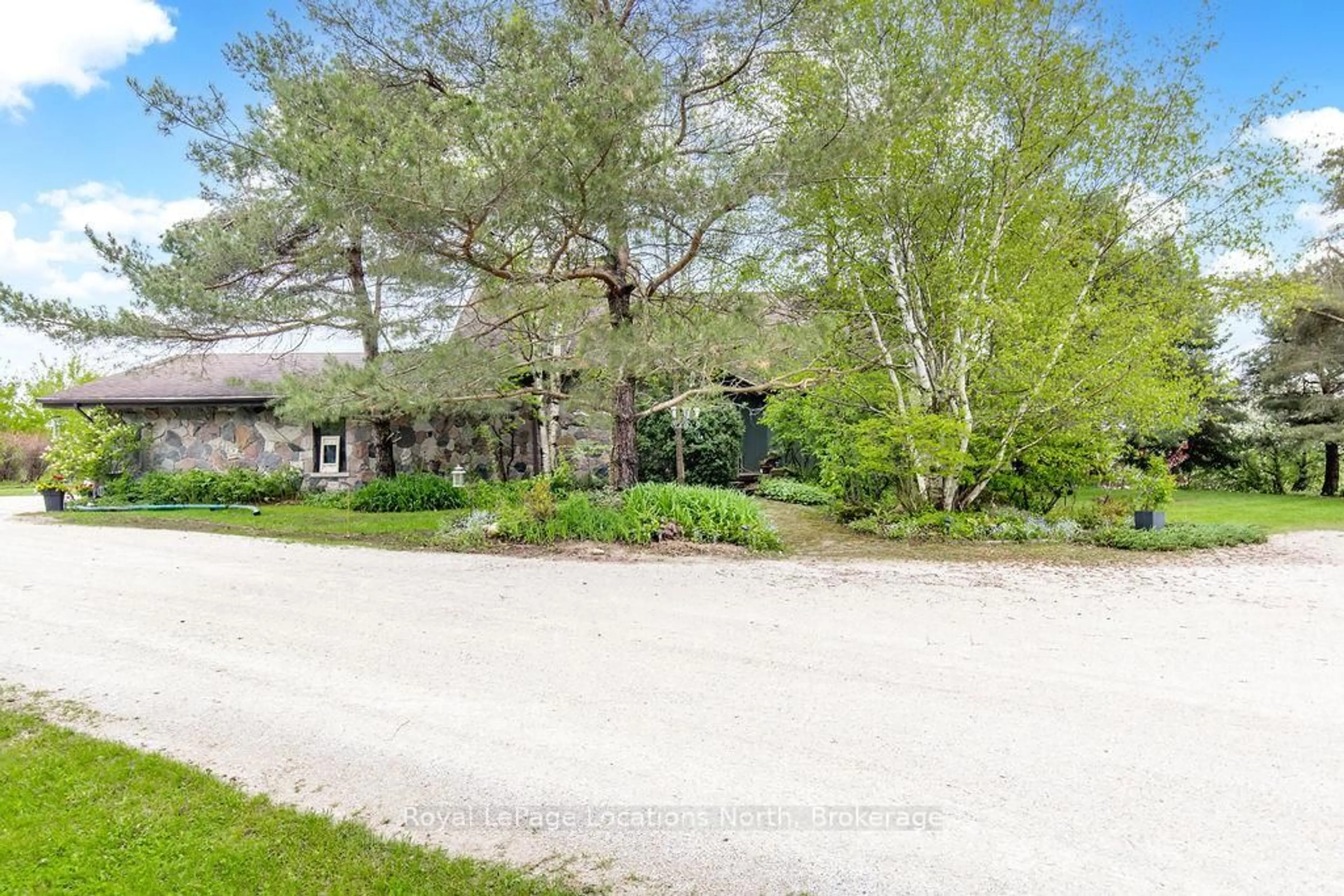 A pic from outside/outdoor area/front of a property/back of a property/a pic from drone, water/lake/river/ocean view for 38 Old Carriage Rd, East Garafraxa Ontario L9W 6B2