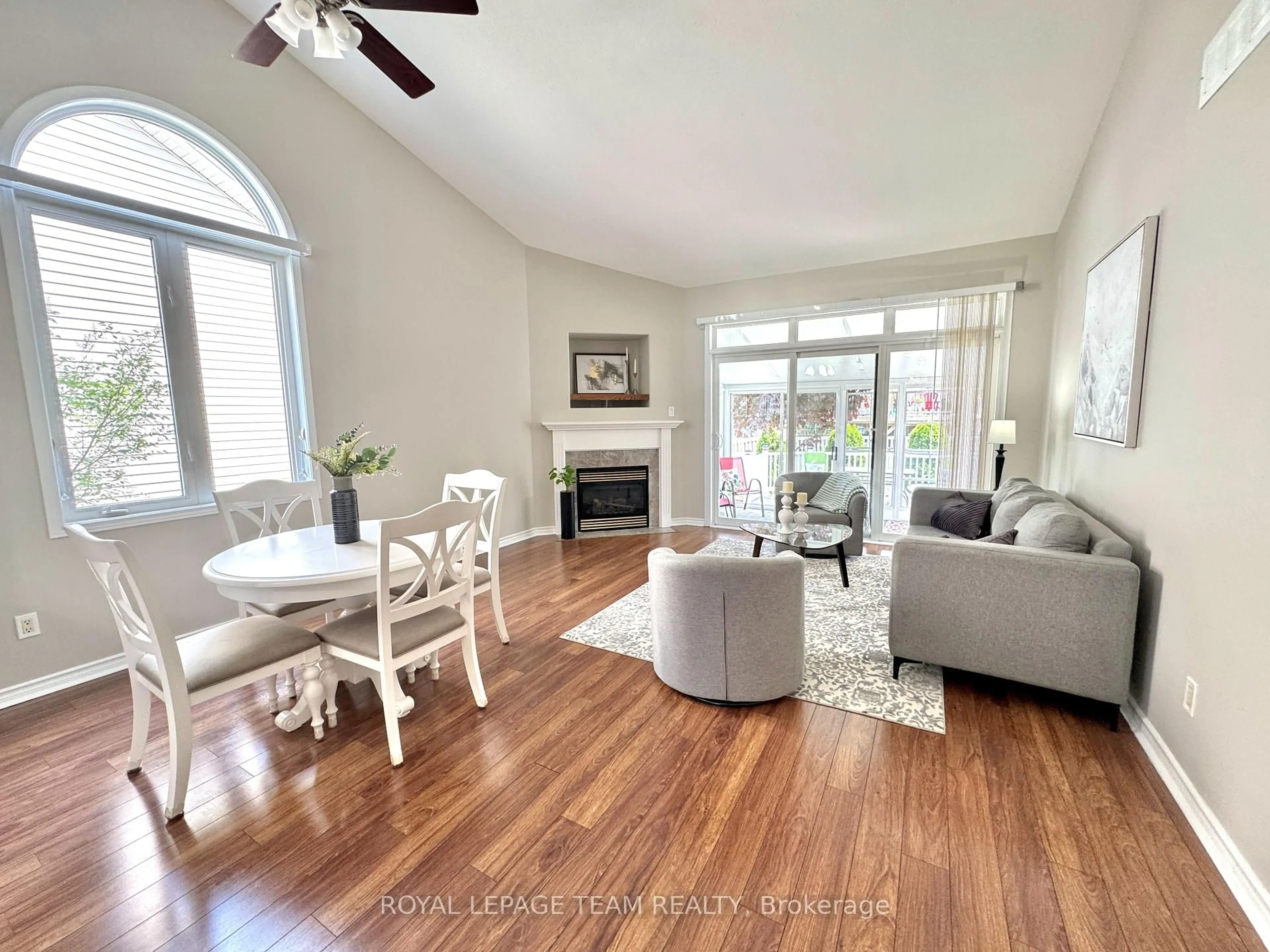 Living room with furniture, wood/laminate floor for 162 Hartsmere Dr, Ottawa Ontario K2S 2H4