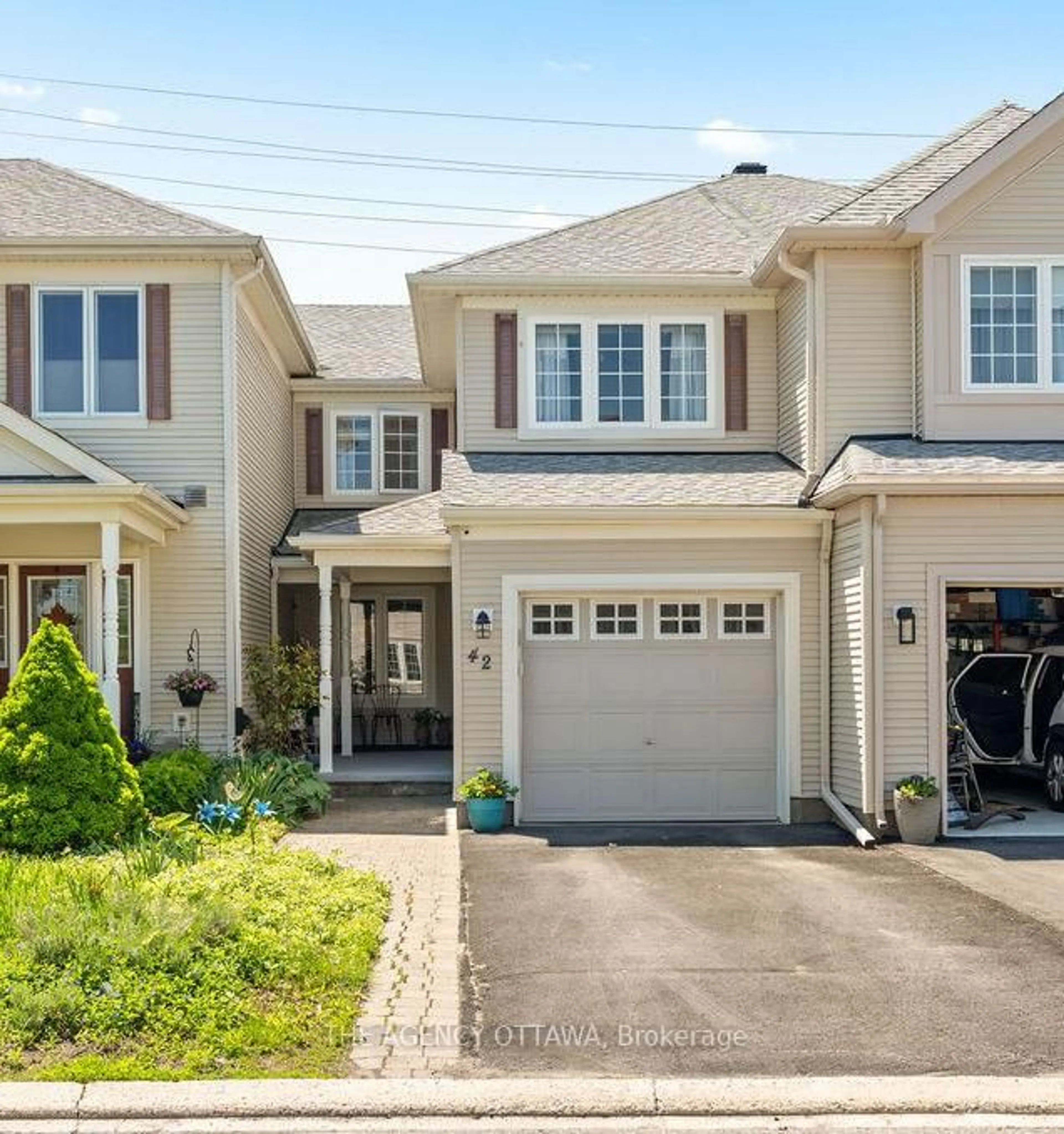 Home with vinyl exterior material, street for 42 Kirkstone Private, Ottawa Ontario K2J 5E7
