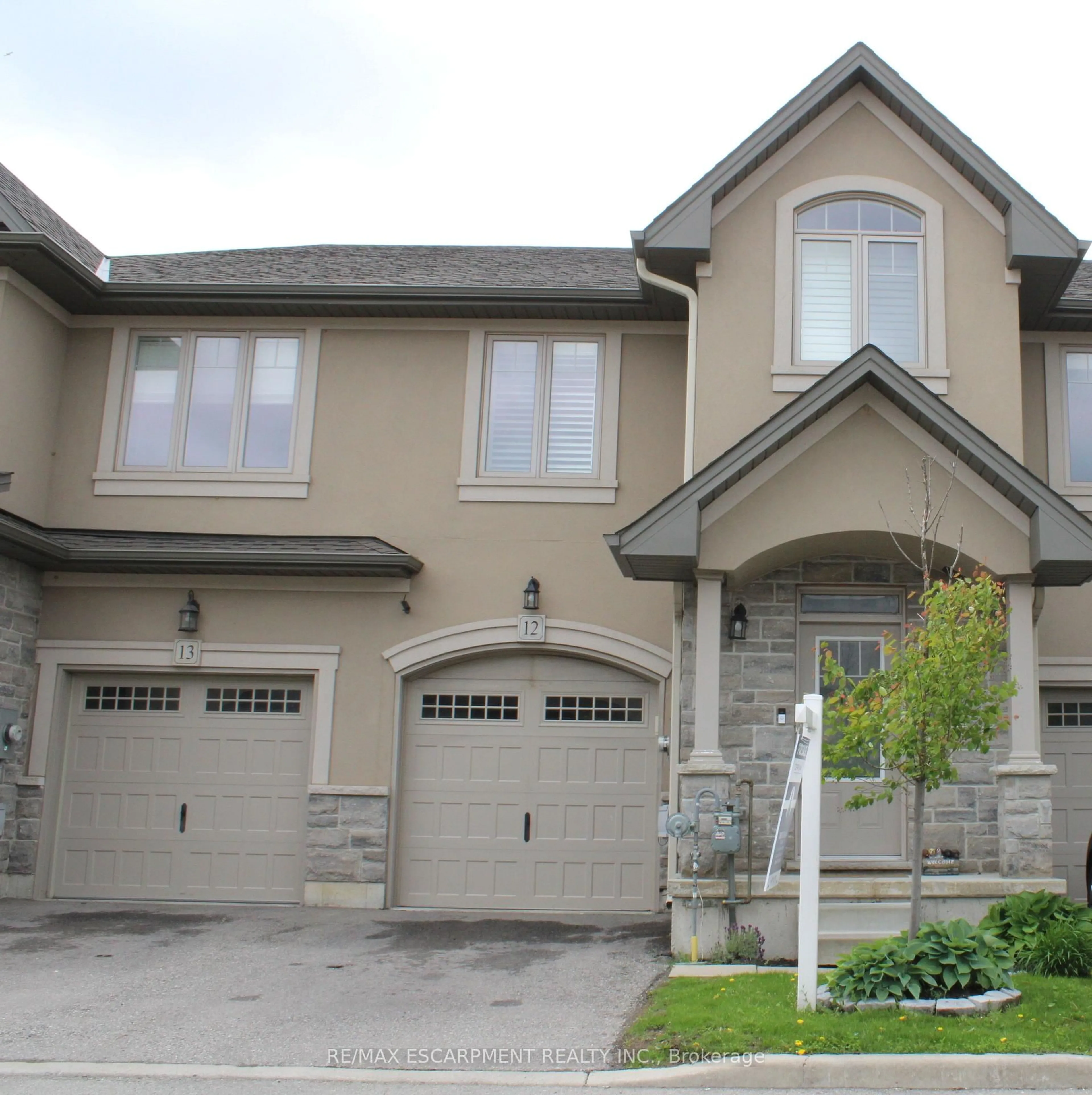 Home with brick exterior material, street for 98 Shoreview Pl #12, Hamilton Ontario L8E 0J4