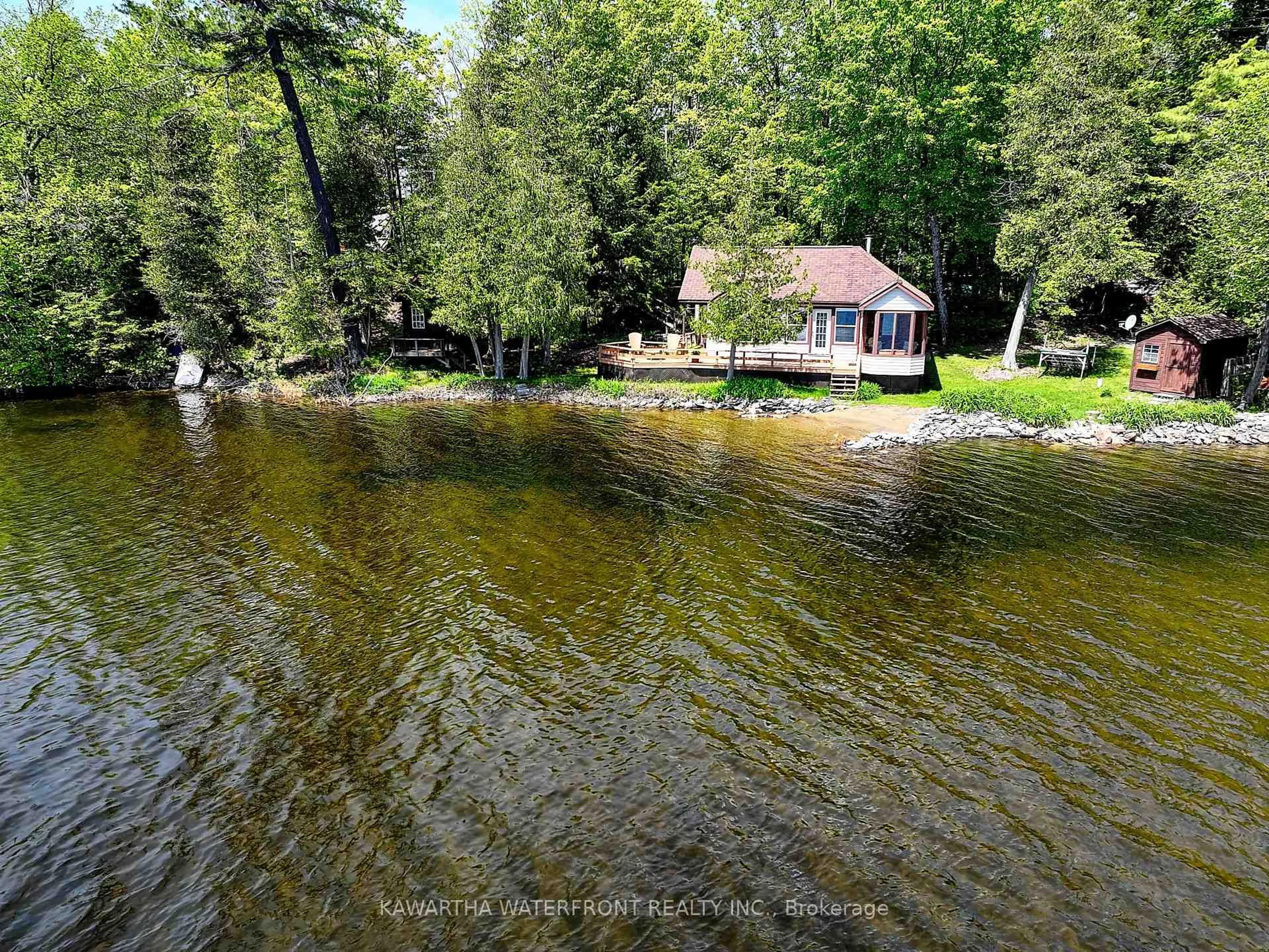 A pic from outside/outdoor area/front of a property/back of a property/a pic from drone, water/lake/river/ocean view for 103 Shadow Lake 2 Rd, Kawartha Lakes Ontario K0M 2L0