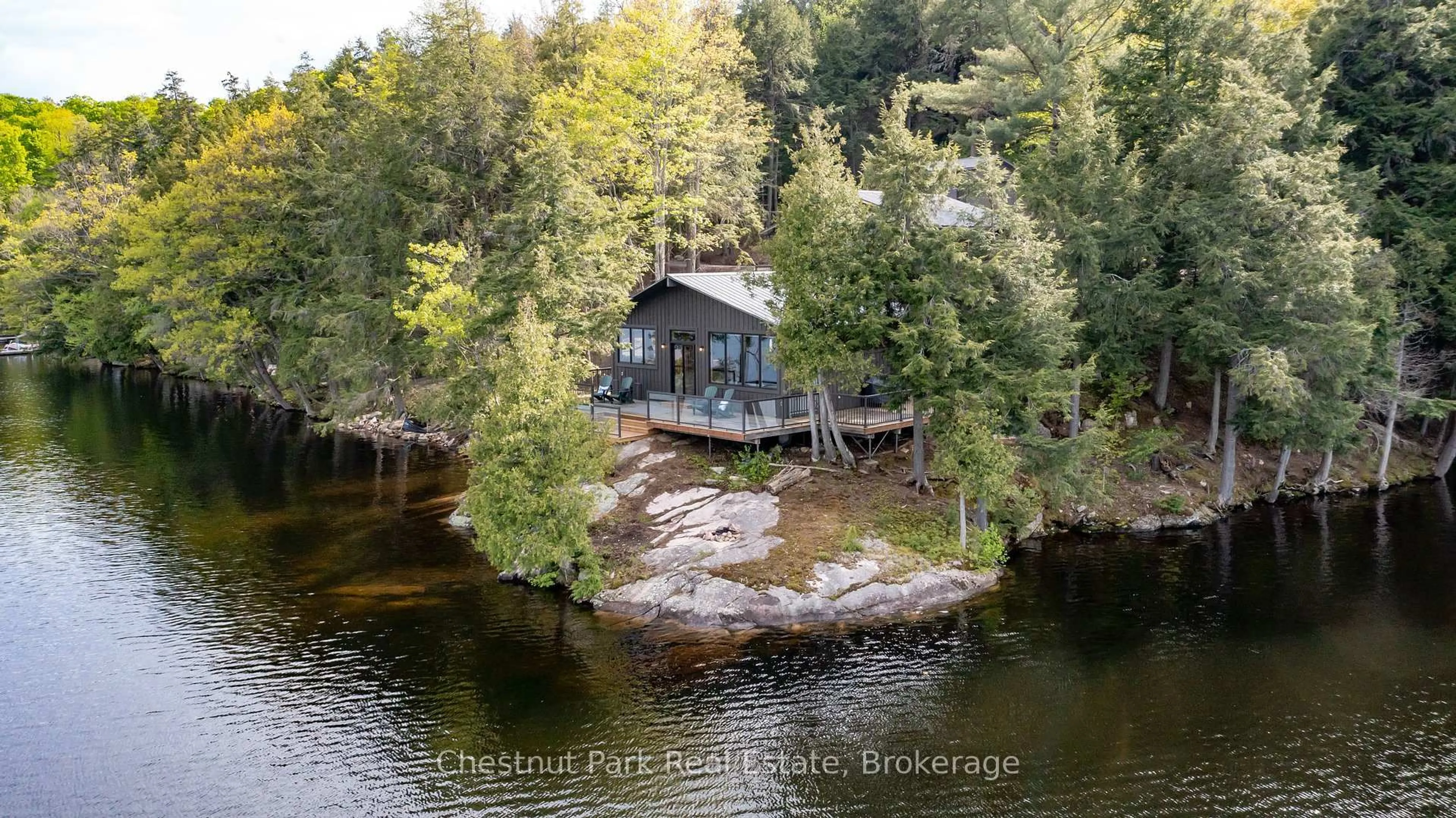 A pic from outside/outdoor area/front of a property/back of a property/a pic from drone, water/lake/river/ocean view for 2438 Kushog Lake Rd, Algonquin Highlands Ontario K0M 1J1