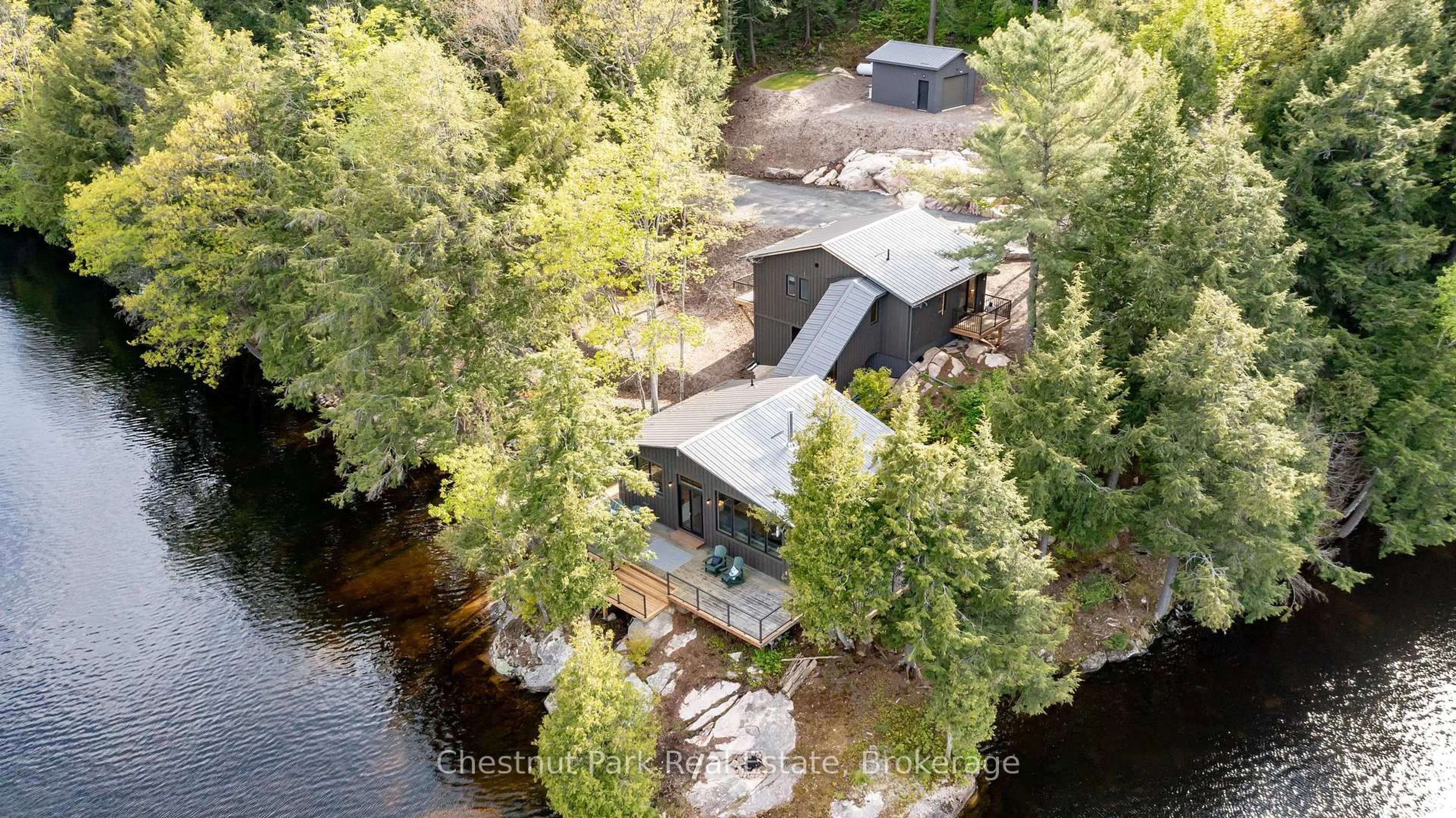 A pic from outside/outdoor area/front of a property/back of a property/a pic from drone, water/lake/river/ocean view for 2438 Kushog Lake Rd, Algonquin Highlands Ontario K0M 1J1