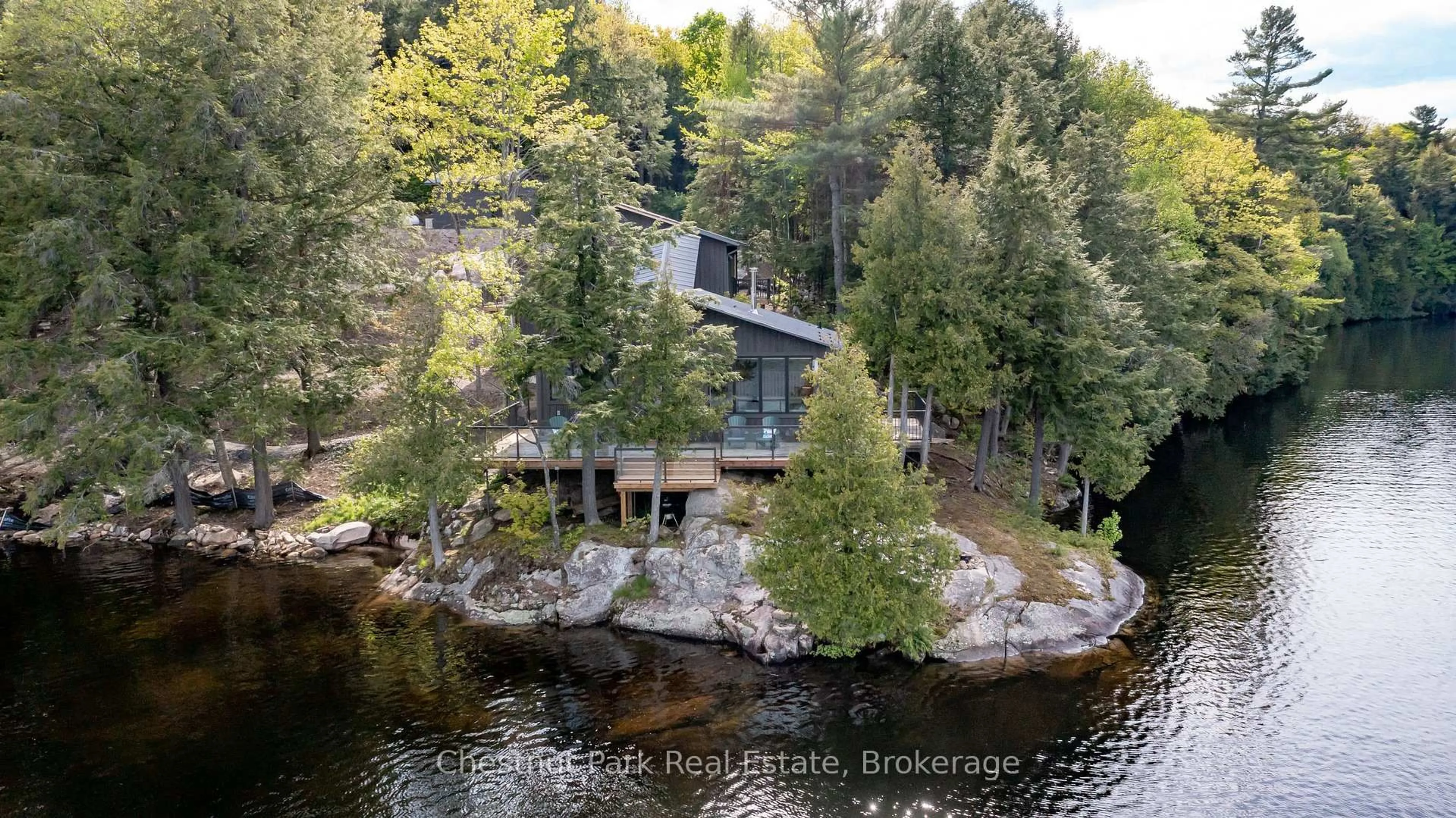 A pic from outside/outdoor area/front of a property/back of a property/a pic from drone, water/lake/river/ocean view for 2438 Kushog Lake Rd, Algonquin Highlands Ontario K0M 1J1