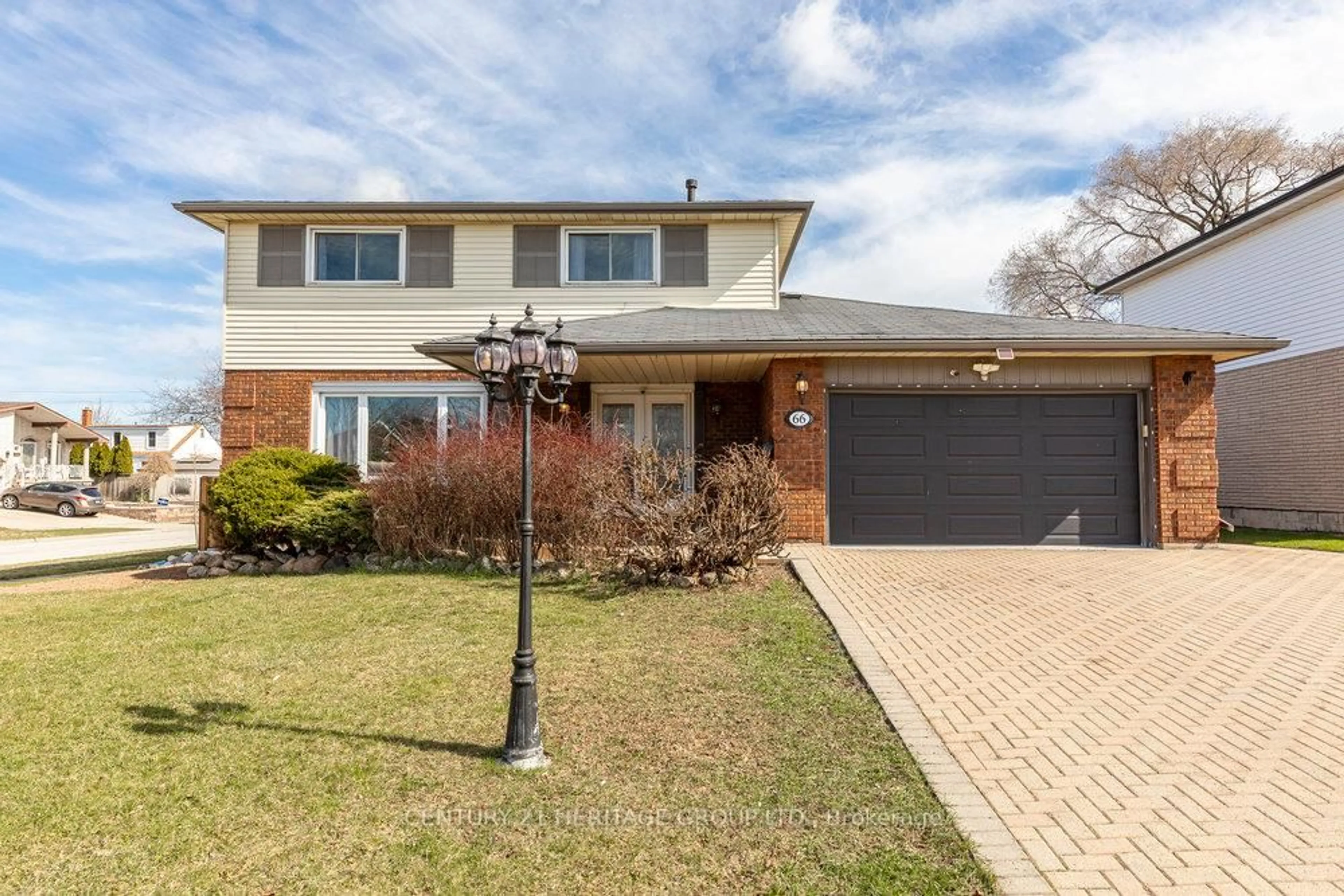 Home with brick exterior material, street for 66 Seaton Place Dr, Hamilton Ontario L8E 4B1