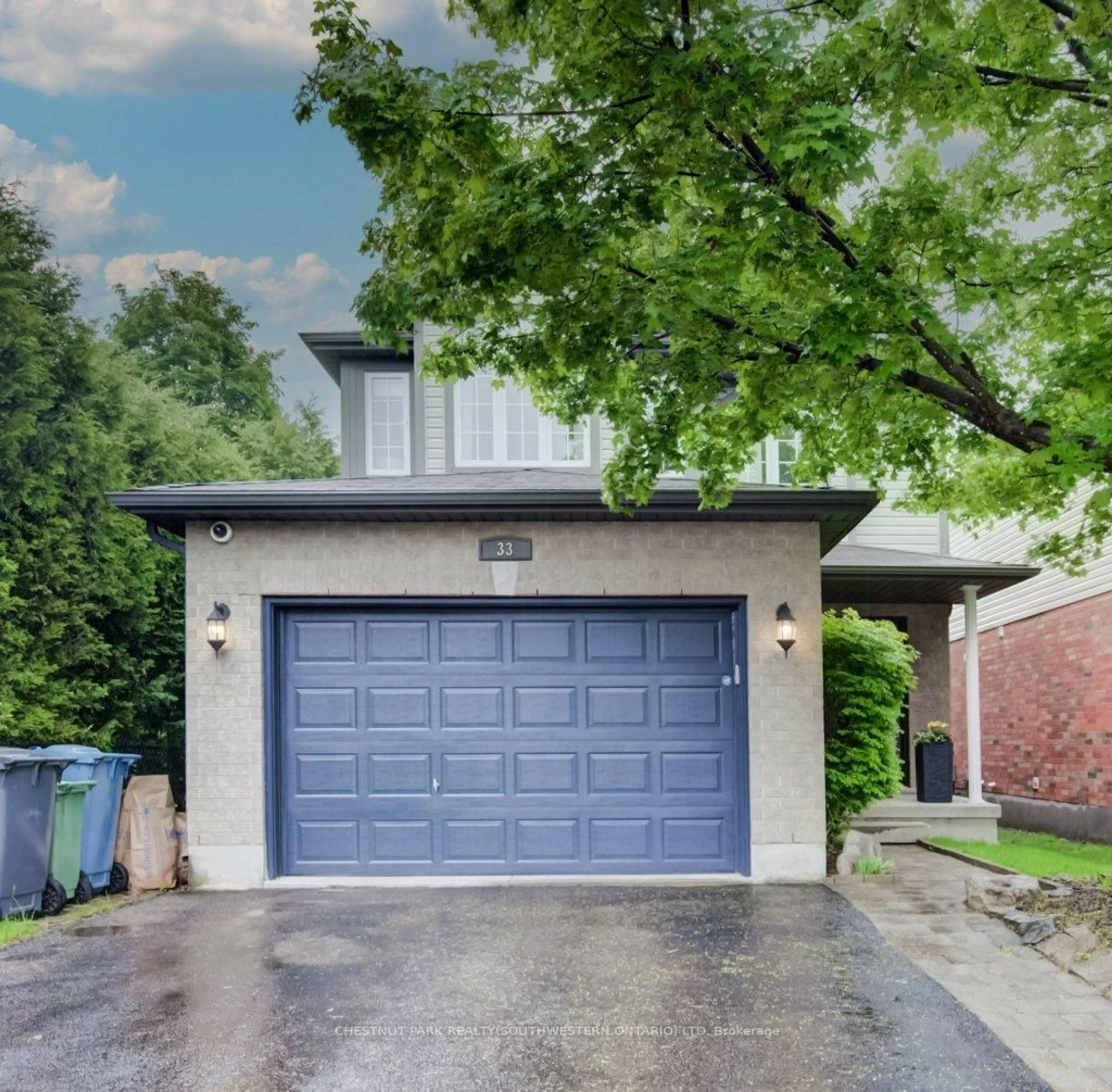 Home with brick exterior material, street for 33 Henderson Dr, Guelph Ontario N1E 0C8