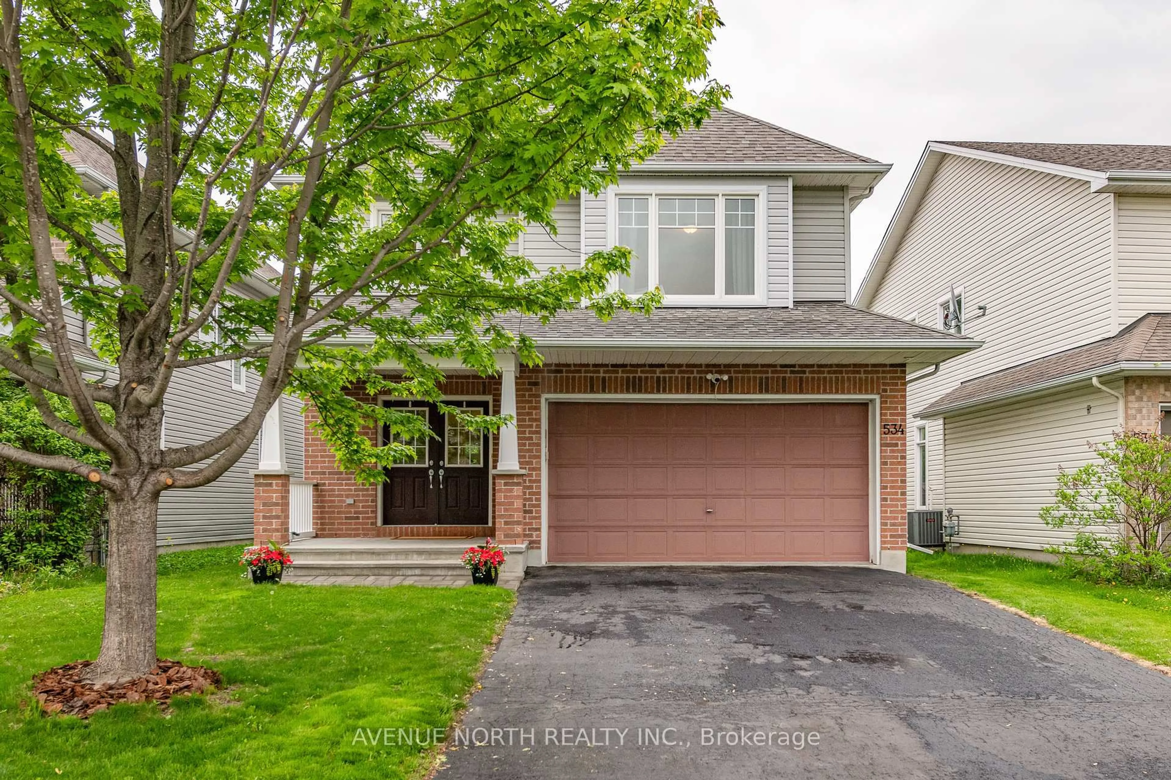 Home with brick exterior material, street for 534 Golden Sedge Way, Ottawa Ontario K1T 0G5