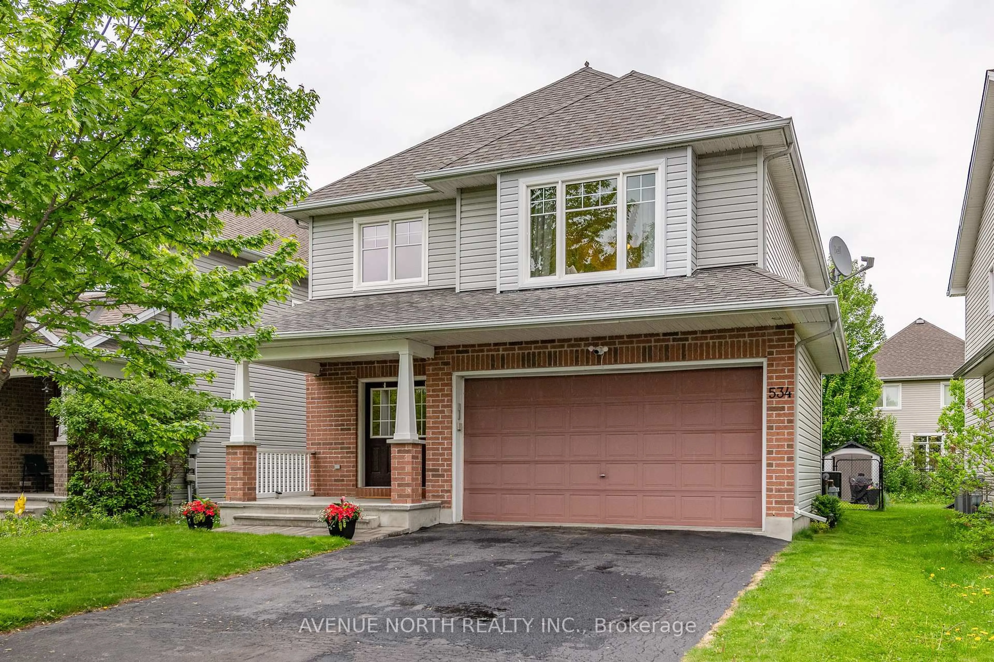 Home with brick exterior material, street for 534 Golden Sedge Way, Ottawa Ontario K1T 0G5