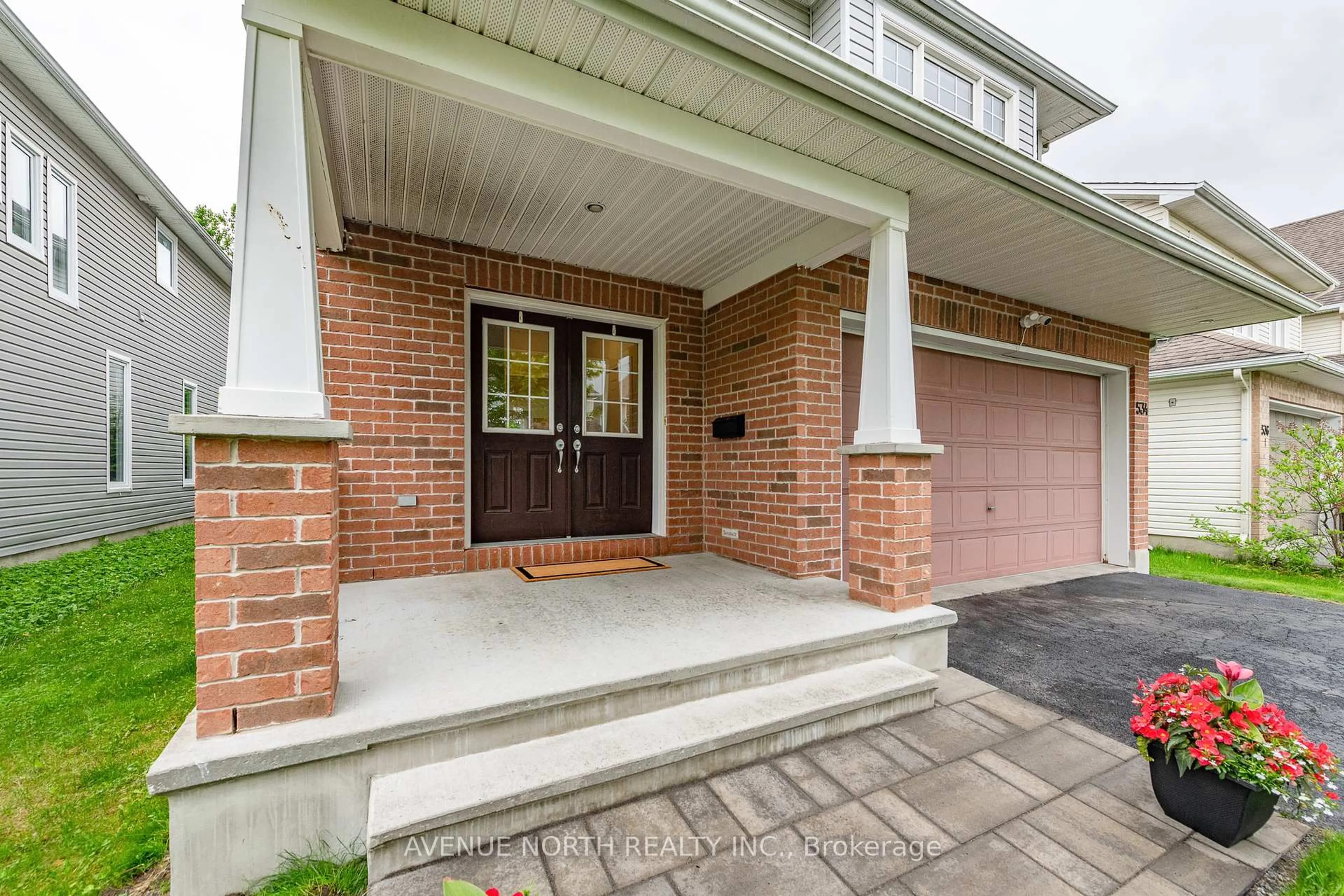 Home with brick exterior material, street for 534 Golden Sedge Way, Ottawa Ontario K1T 0G5