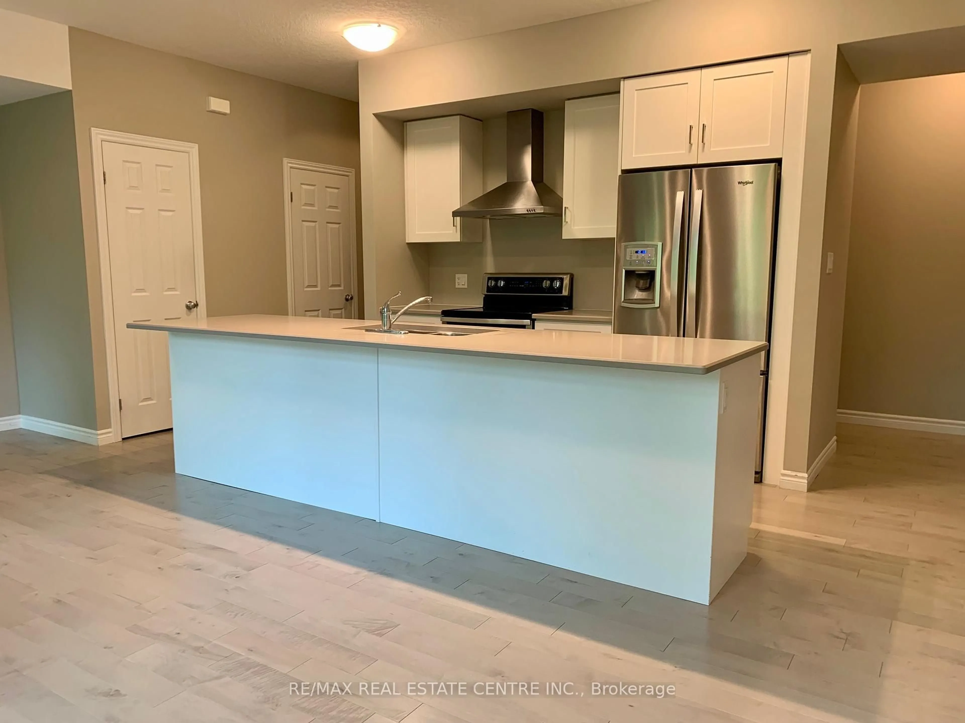 Open concept kitchen, ceramic/tile floor for 107 Westra Dr #49, Guelph Ontario N1K 1Z7