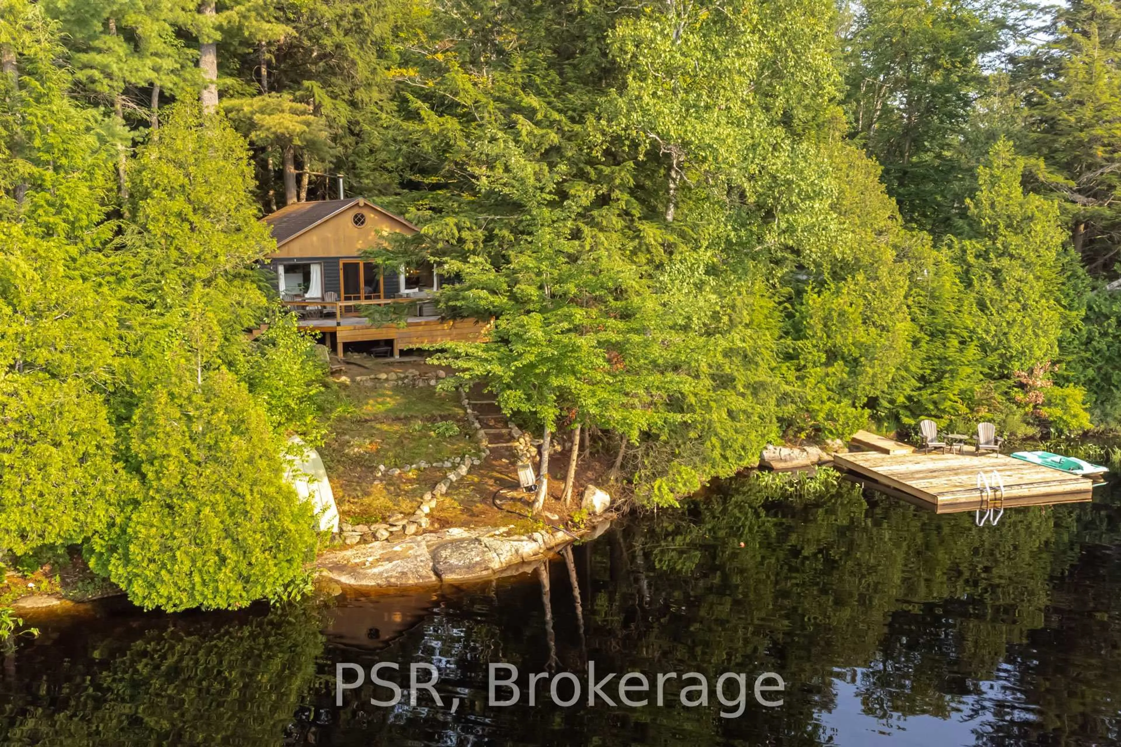 A pic from outside/outdoor area/front of a property/back of a property/a pic from drone, water/lake/river/ocean view for 1027 NORTH PINE Dr, Lake of Bays Ontario P0A 1E0