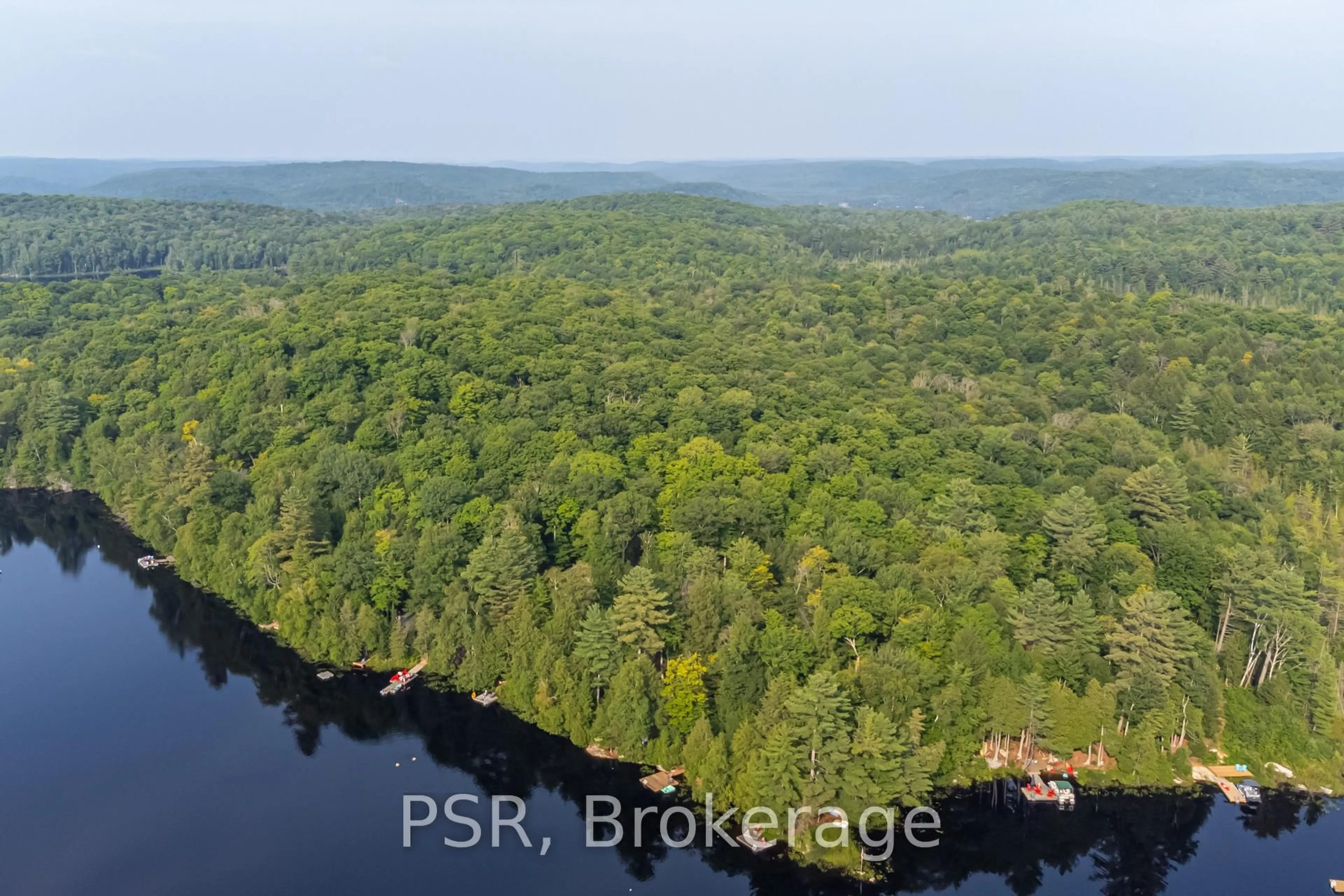 A pic from outside/outdoor area/front of a property/back of a property/a pic from drone, water/lake/river/ocean view for 1027 NORTH PINE Dr, Lake of Bays Ontario P0A 1E0