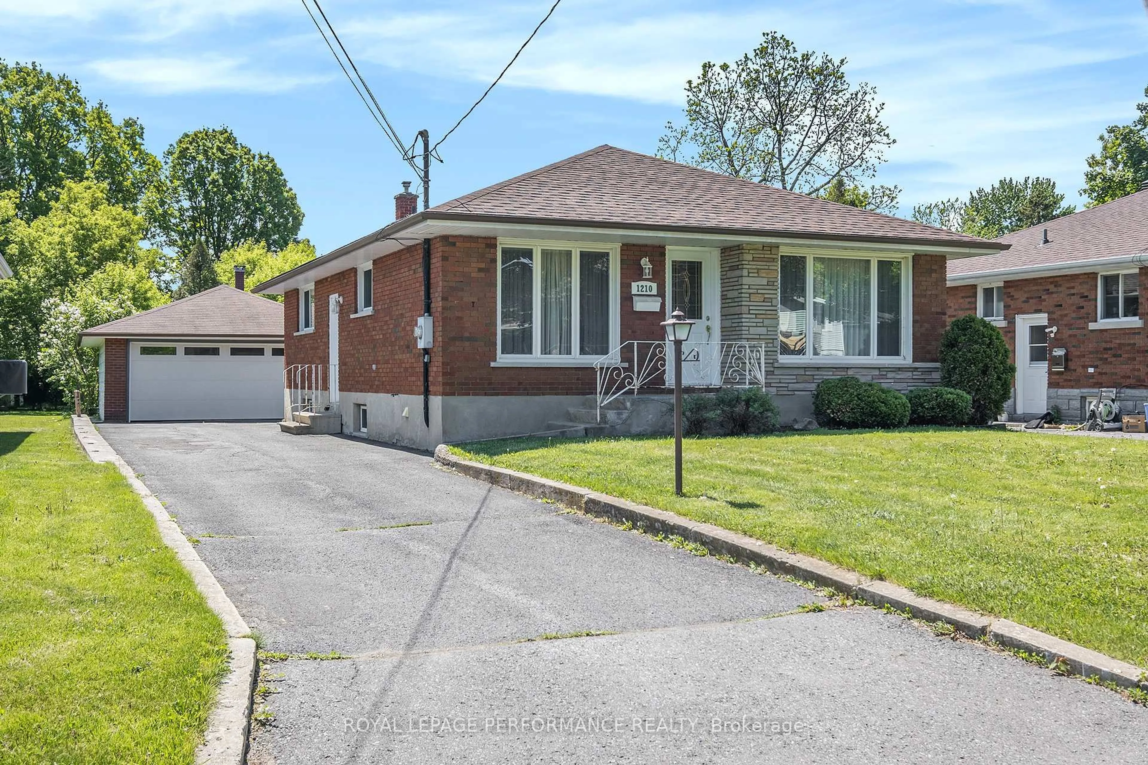 Home with brick exterior material, street for 1210 Queen St, Cornwall Ontario K6J 1P8