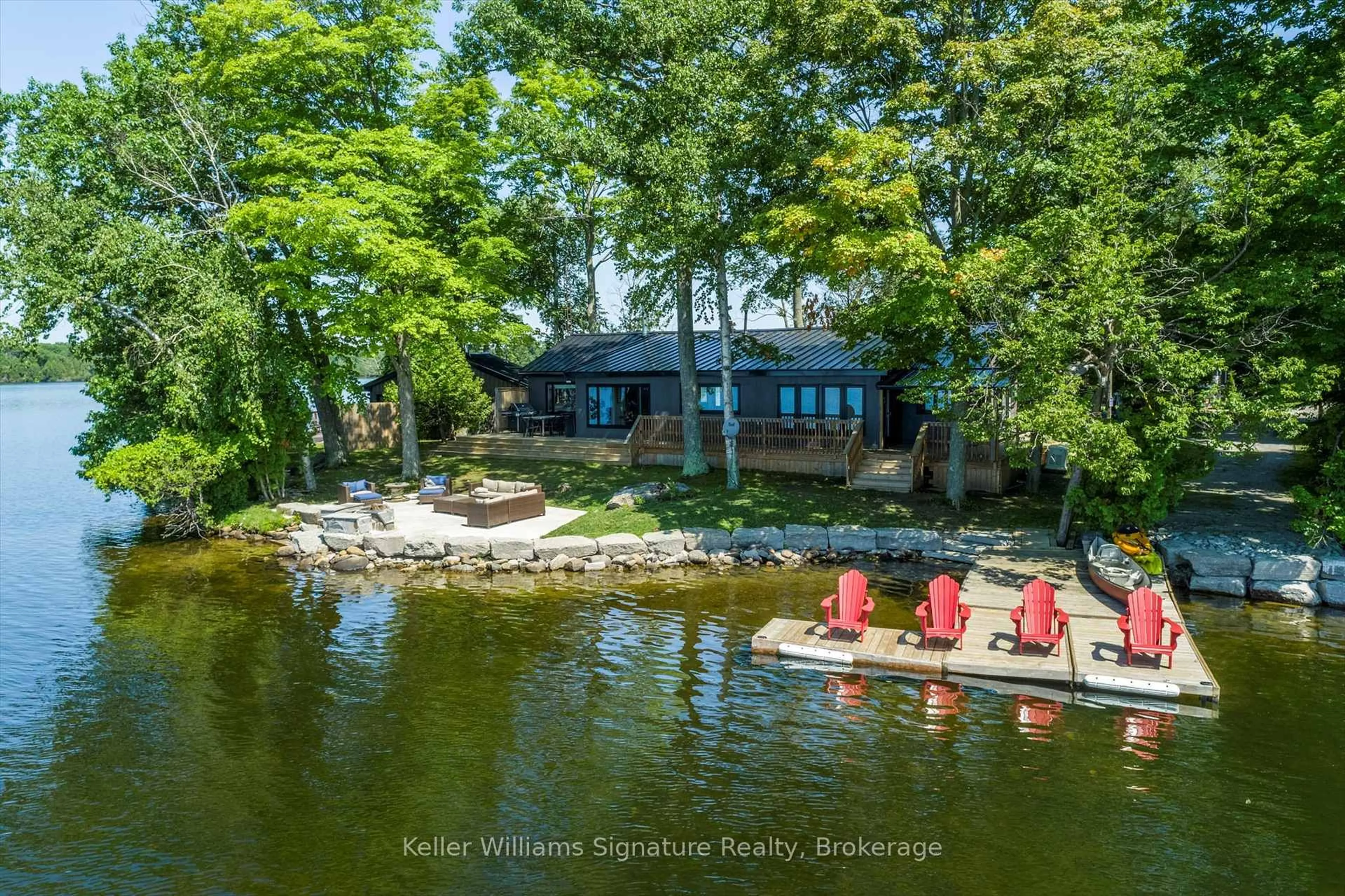 A pic from outside/outdoor area/front of a property/back of a property/a pic from drone, water/lake/river/ocean view for 135 Driftwood Village Rd, Kawartha Lakes Ontario K0M 1K0