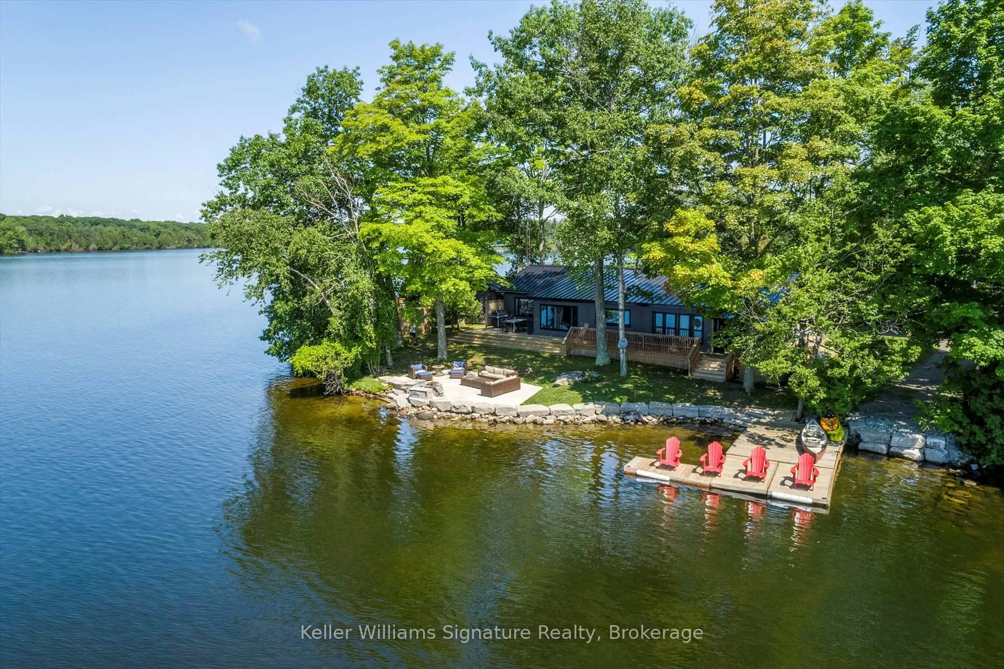 A pic from outside/outdoor area/front of a property/back of a property/a pic from drone, water/lake/river/ocean view for 135 Driftwood Village Rd, Kawartha Lakes Ontario K0M 1K0