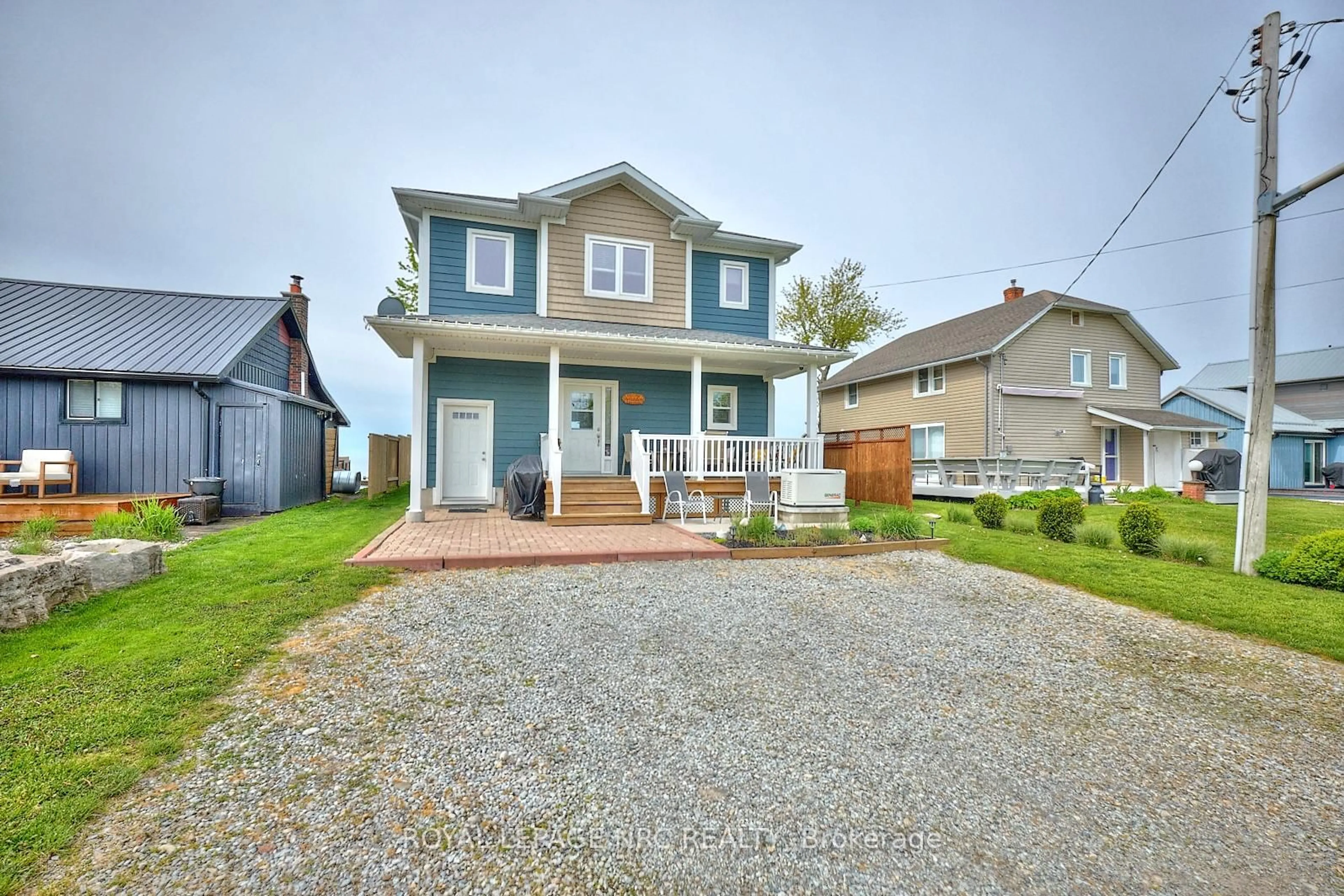 A pic from outside/outdoor area/front of a property/back of a property/a pic from drone, street for 11565 Beach Rd, Wainfleet Ontario L0S 1V0