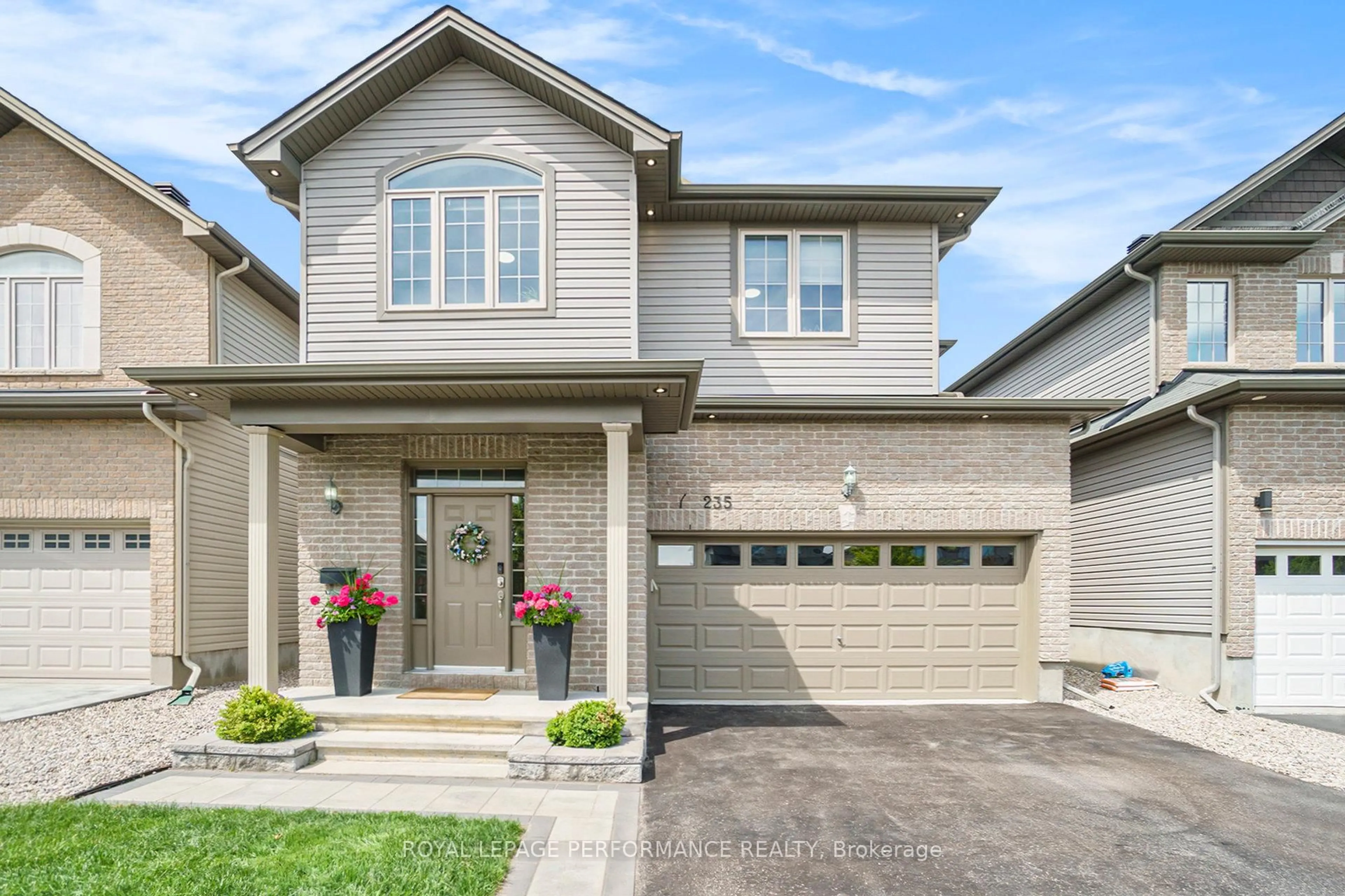 Home with brick exterior material, street for 235 Fountainhead Dr, Ottawa Ontario K1W 0H3