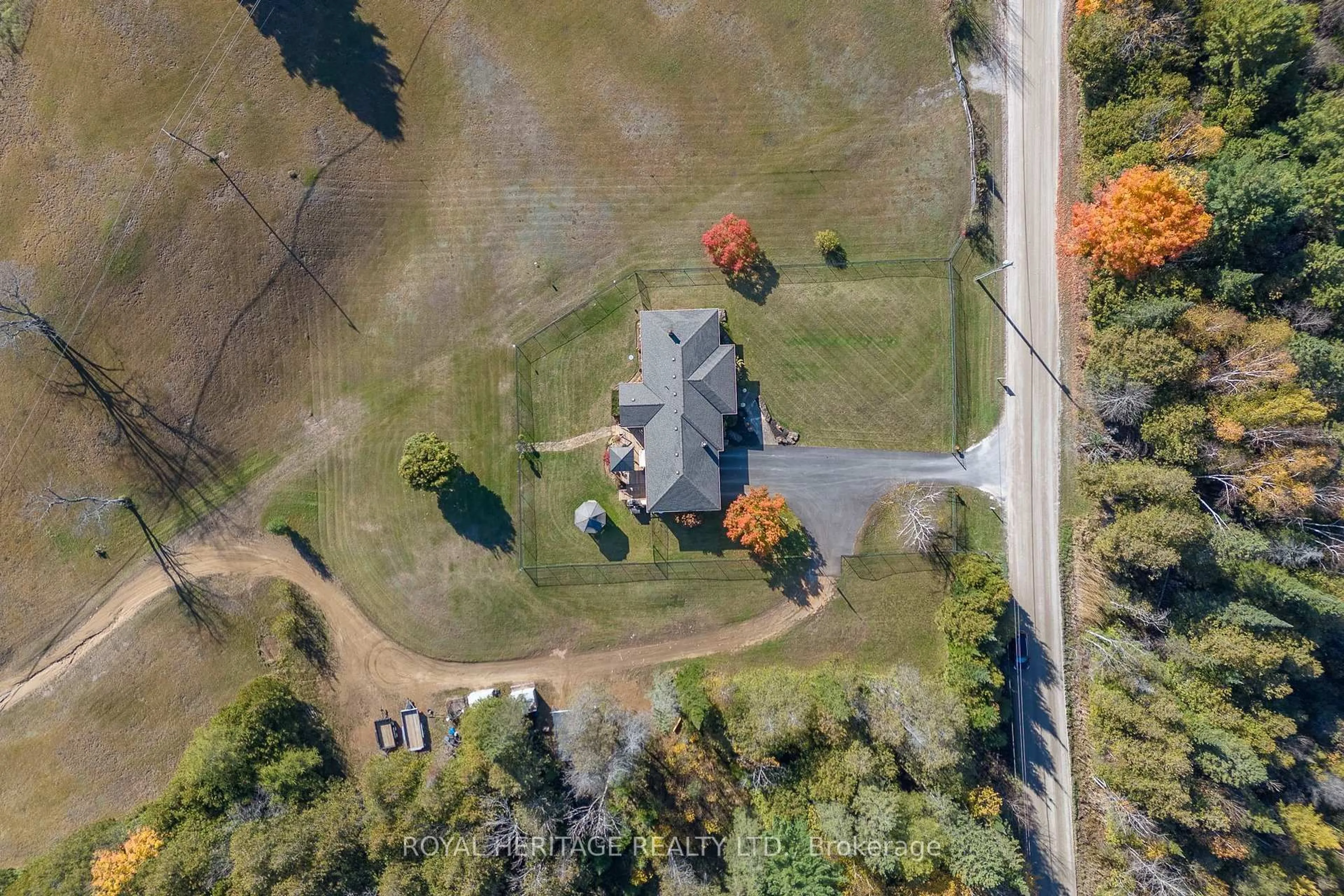 A pic from outside/outdoor area/front of a property/back of a property/a pic from drone, unknown for 26 BACK BAY Rd, Trent Lakes Ontario K0M 2W0
