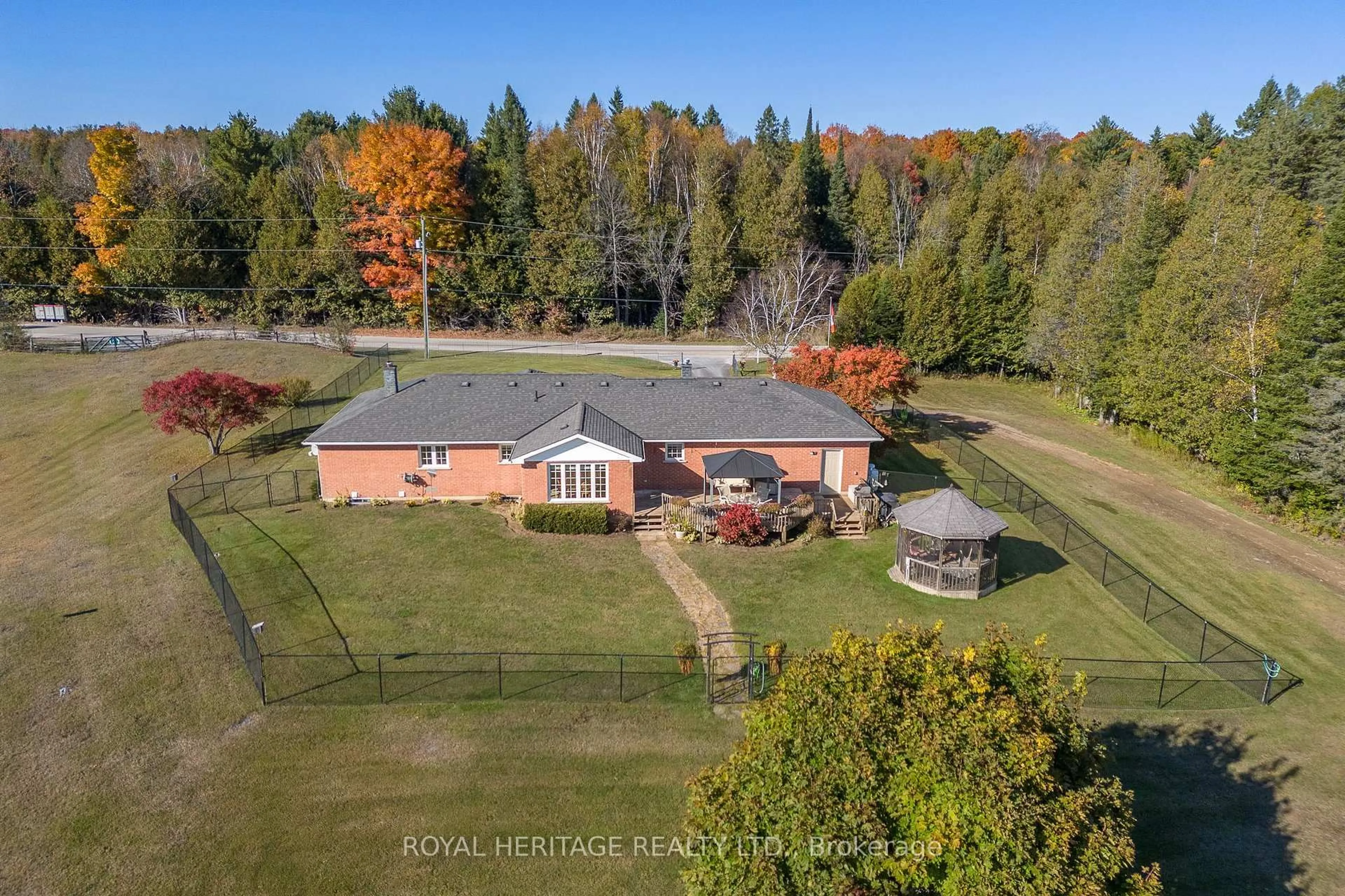 A pic from outside/outdoor area/front of a property/back of a property/a pic from drone, water/lake/river/ocean view for 26 BACK BAY Rd, Trent Lakes Ontario K0M 2W0