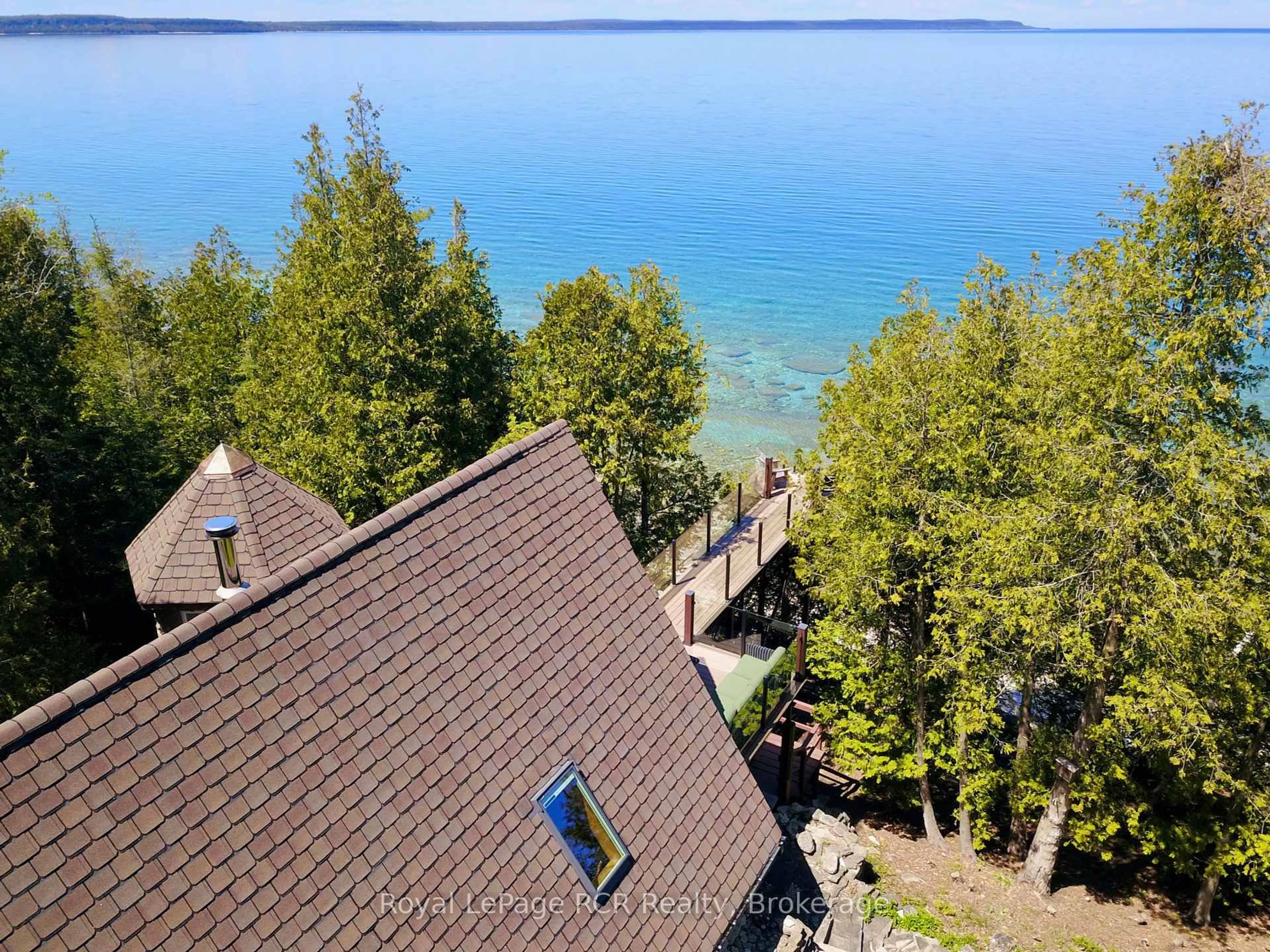 A pic from outside/outdoor area/front of a property/back of a property/a pic from drone, water/lake/river/ocean view for 30 Cape Chin N Shore Rd, Northern Bruce Peninsula Ontario N0H 1W0