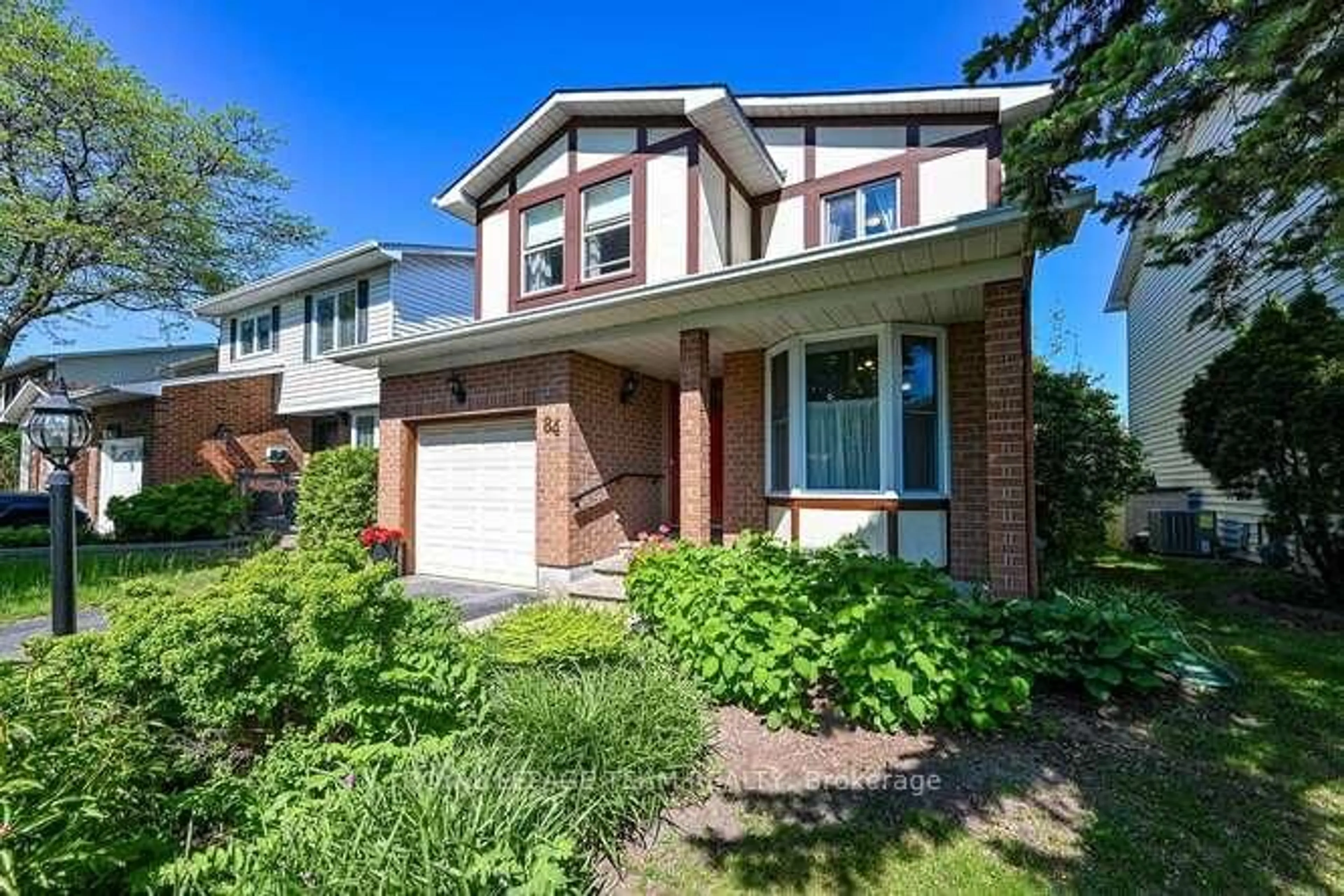 Home with brick exterior material, street for 84 Tamblyn Cres, Kanata Ontario K2L 3A4